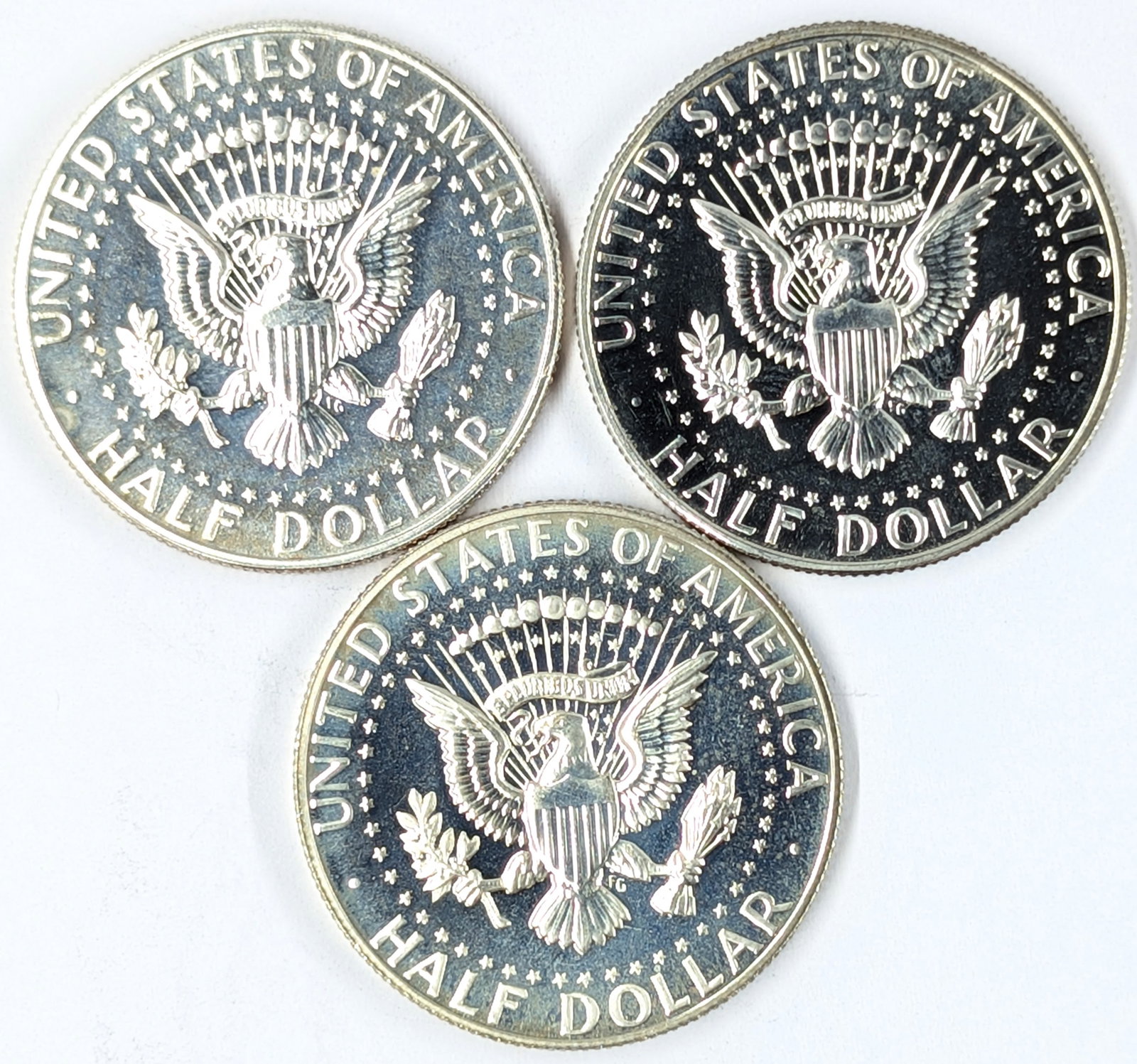 Lot of 3 Silver John F Kennedy Half Dollars - 1967, 1968-S, 1969-S - All Uncirculated, Some Toned - 2