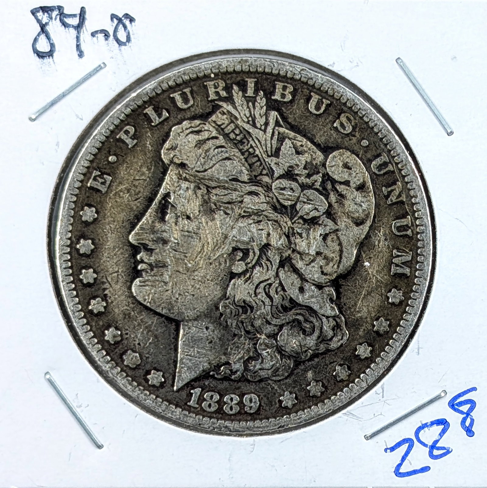1889-O Morgan Silver Dollar: Silver