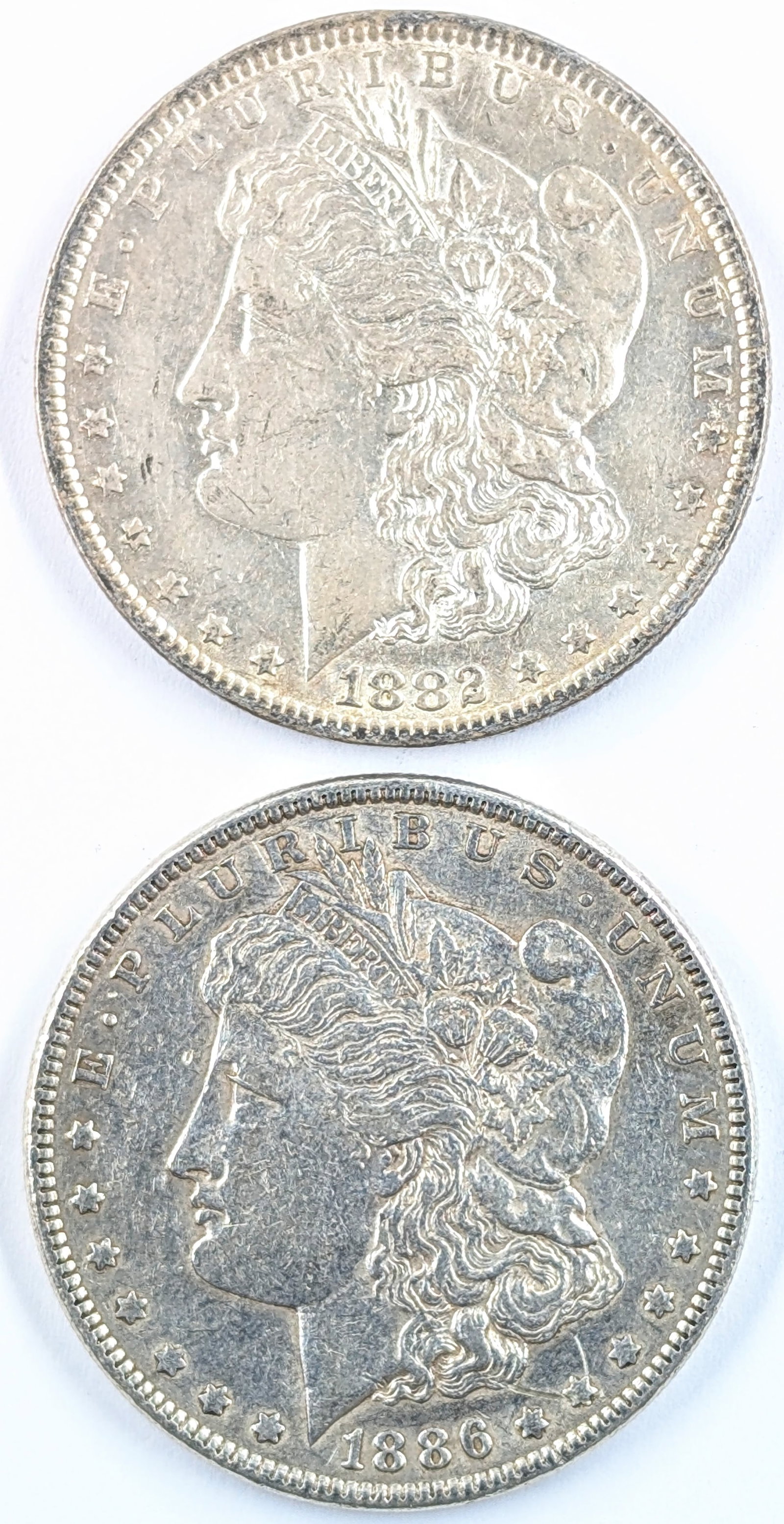Lot of 2 Morgan Silver Dollars - 1882, 1886: Silver