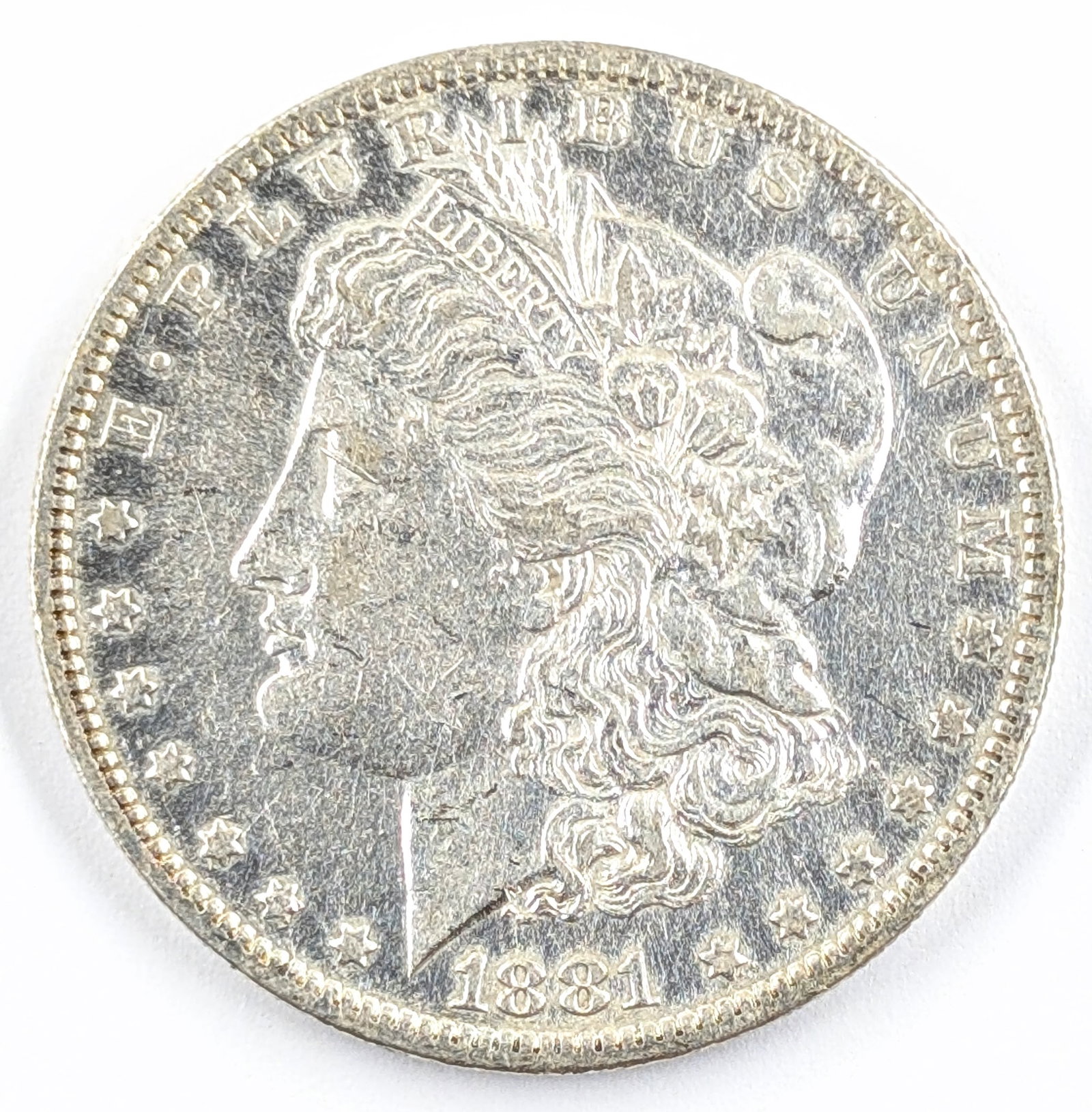1881-O Morgan Silver Dollar: Silver