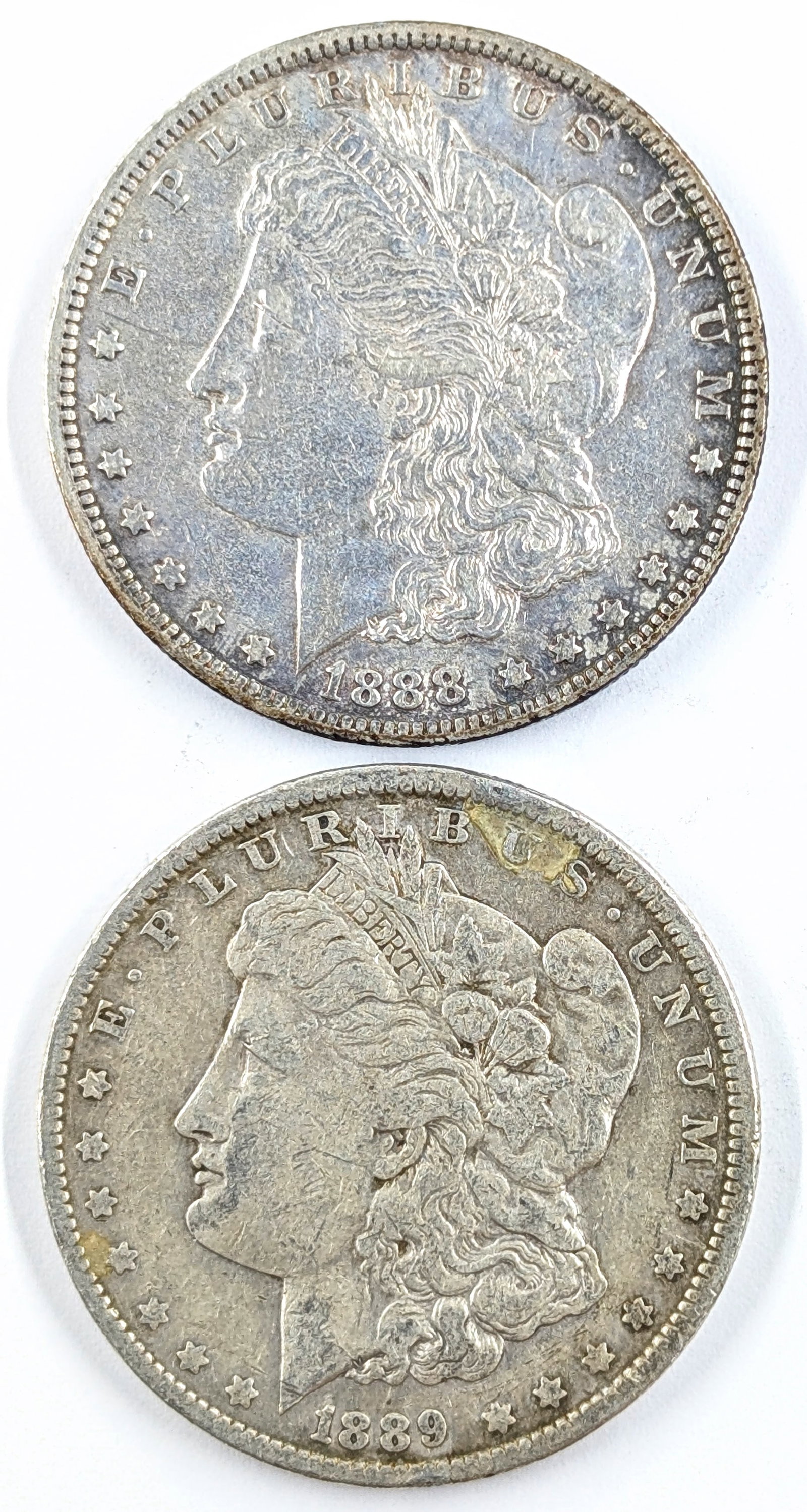 Lot of 2 Morgan Silver Dollars- 1888-O, 1889-O: Silver