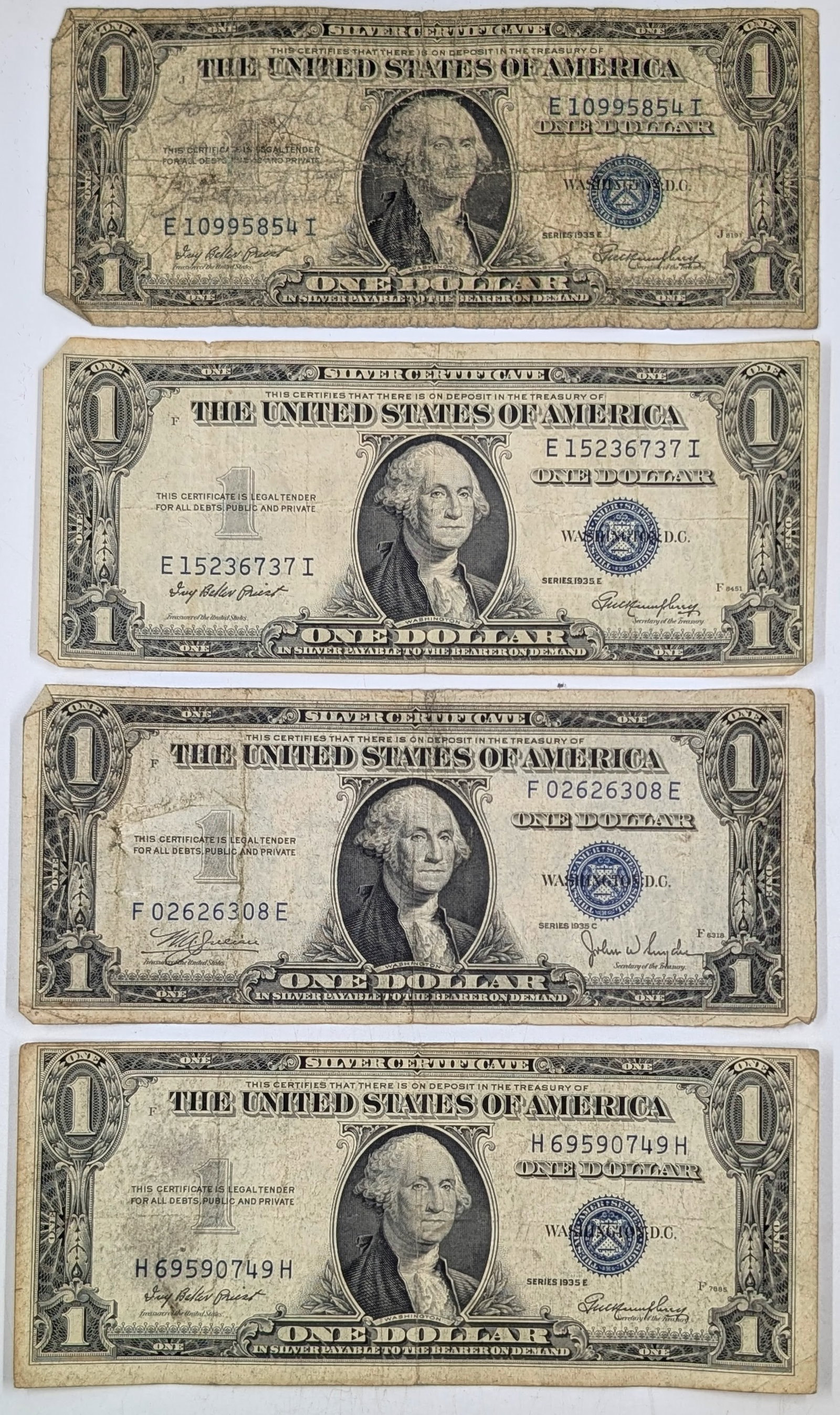 Lot of 4 - $1 Notes - Silver Certificates- 1935 E(3), 1935 C (1 of 2)
