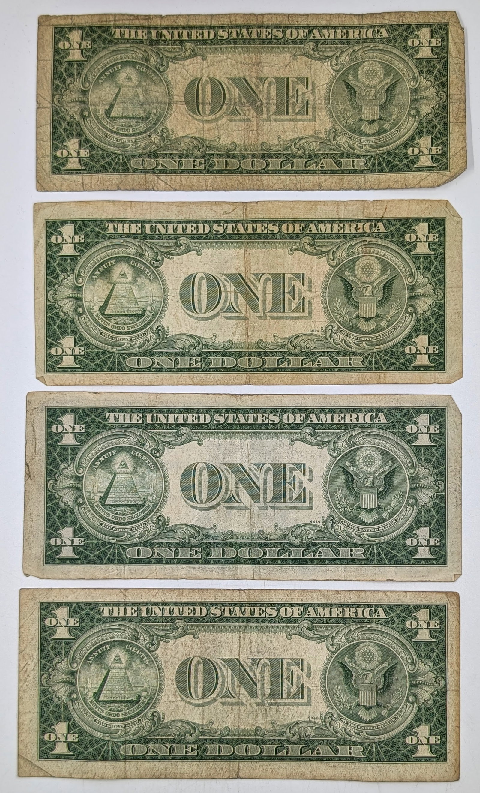 Lot of 4 - $1 Notes - Silver Certificates- 1935 E(3), 1935 C - 2