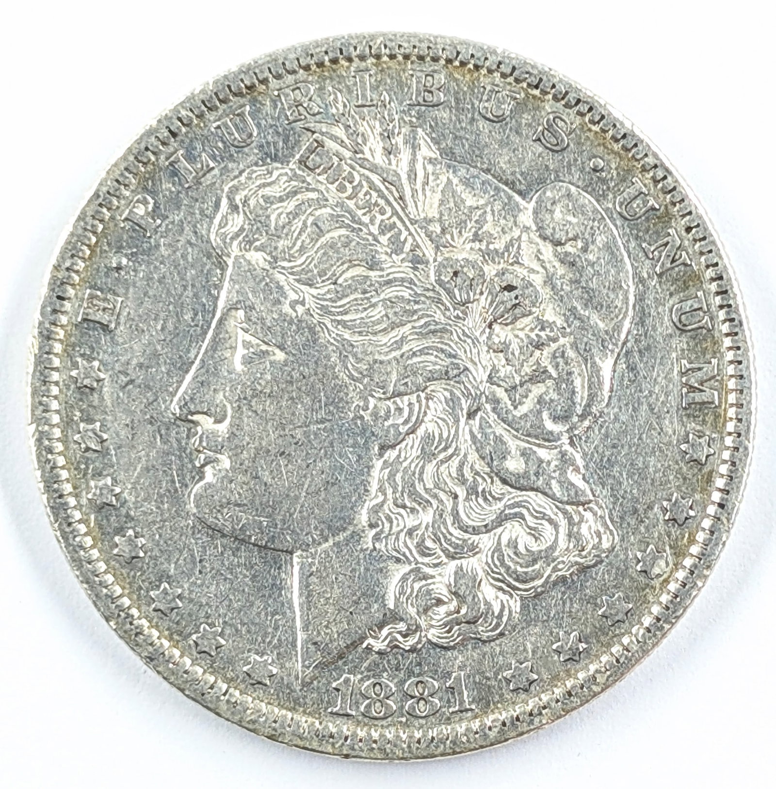 1881-O Morgan Silver Dollar: Silver