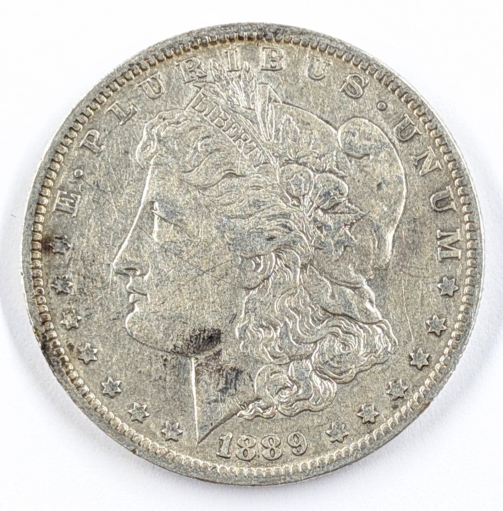1889-O Morgan Silver Dollar: Silver