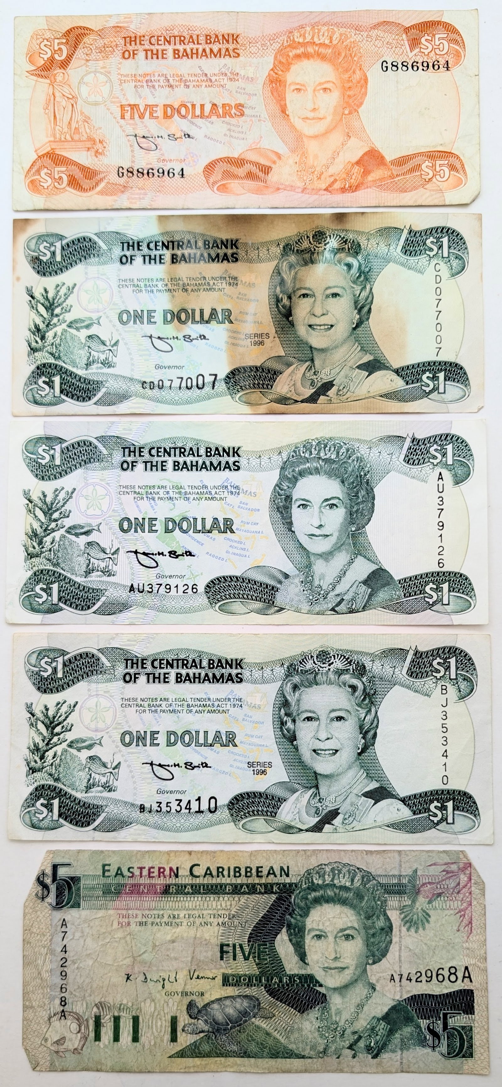 Lot of 5 Bahamas & Eastern Caribbean Notes - $1 & $5: Circulated to Heavily Circulated Condition