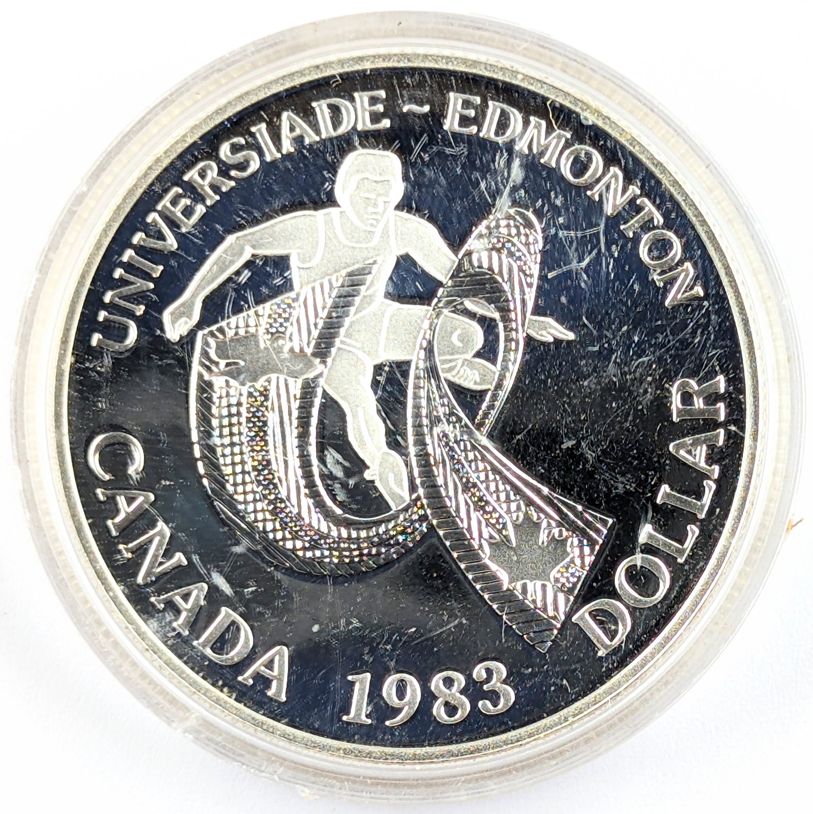 1983 Canadian Silver $1 - World University Games: 50% Silver