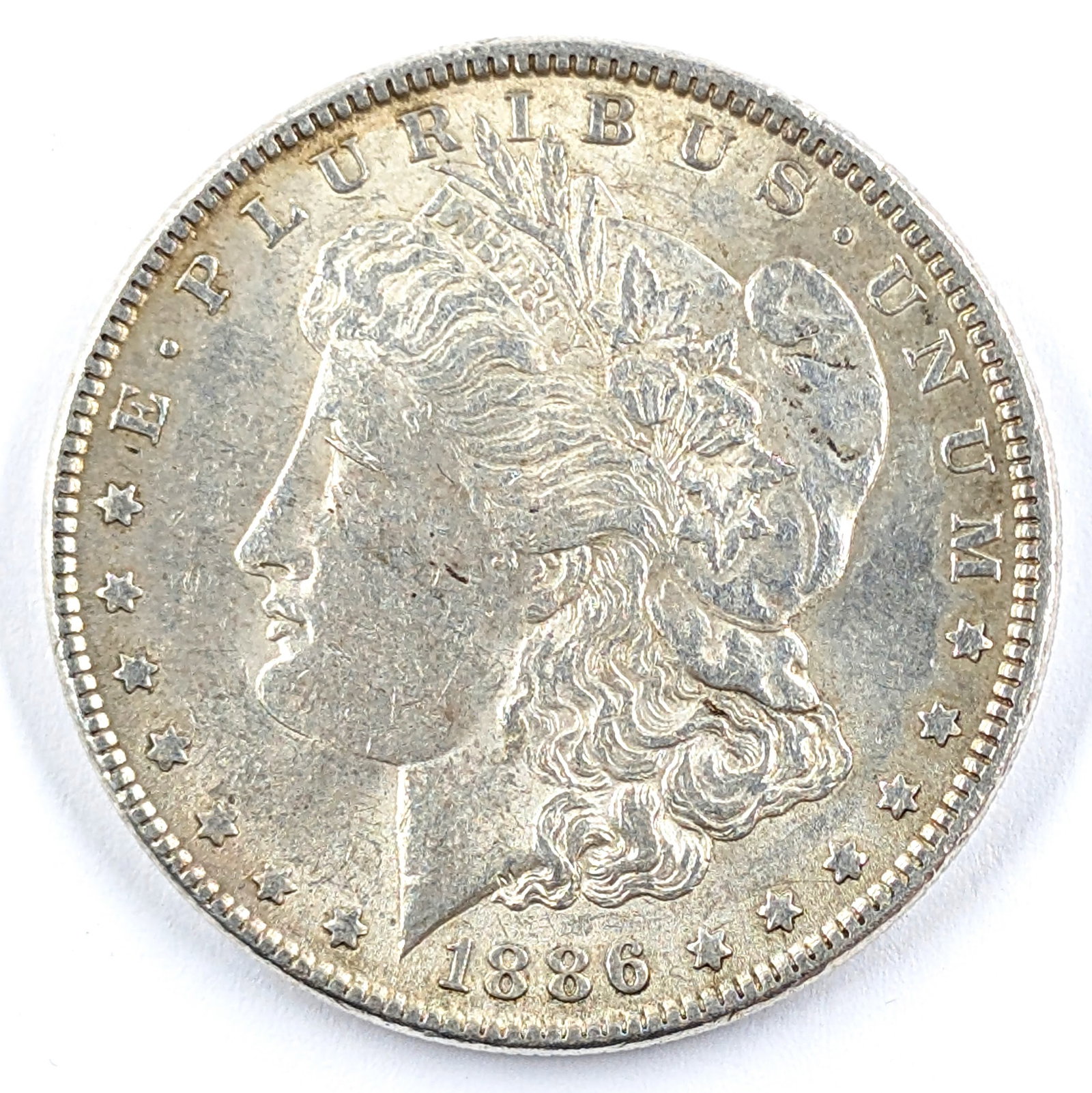 1886 Morgan Silver Dollar - AU (1 of 2)