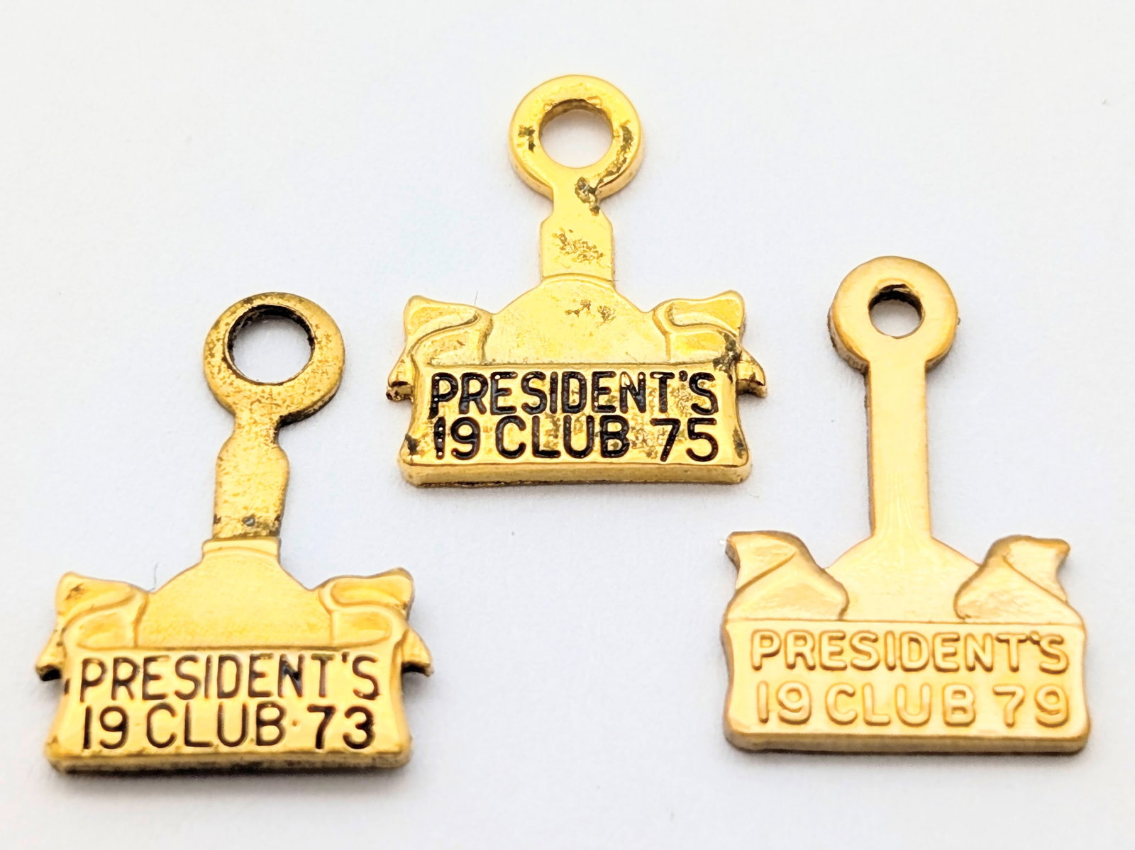 Lot of 3 President's Club Lapel Pin Charms - One marked 12K Gold filled (1 of 3)