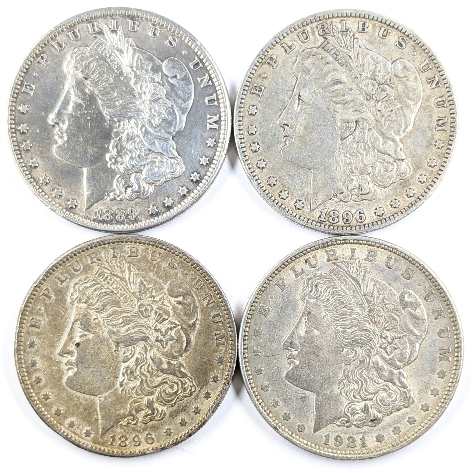 Lot of 4 Morgan Silver Dollars - 1889-1921: Silver