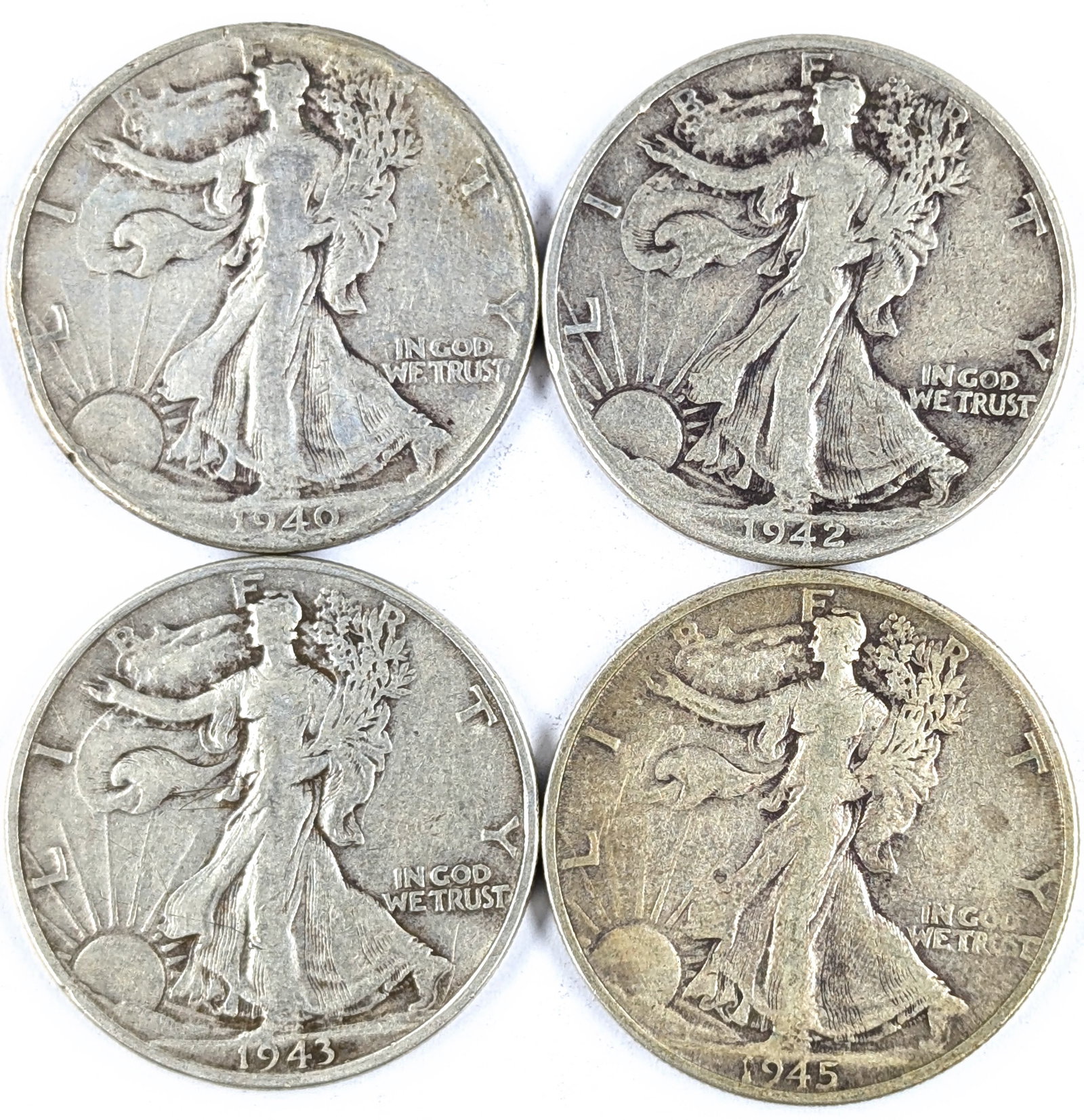 Lot of 4 Silver Walking Liberty Half Dollars 1940-1945: Silver