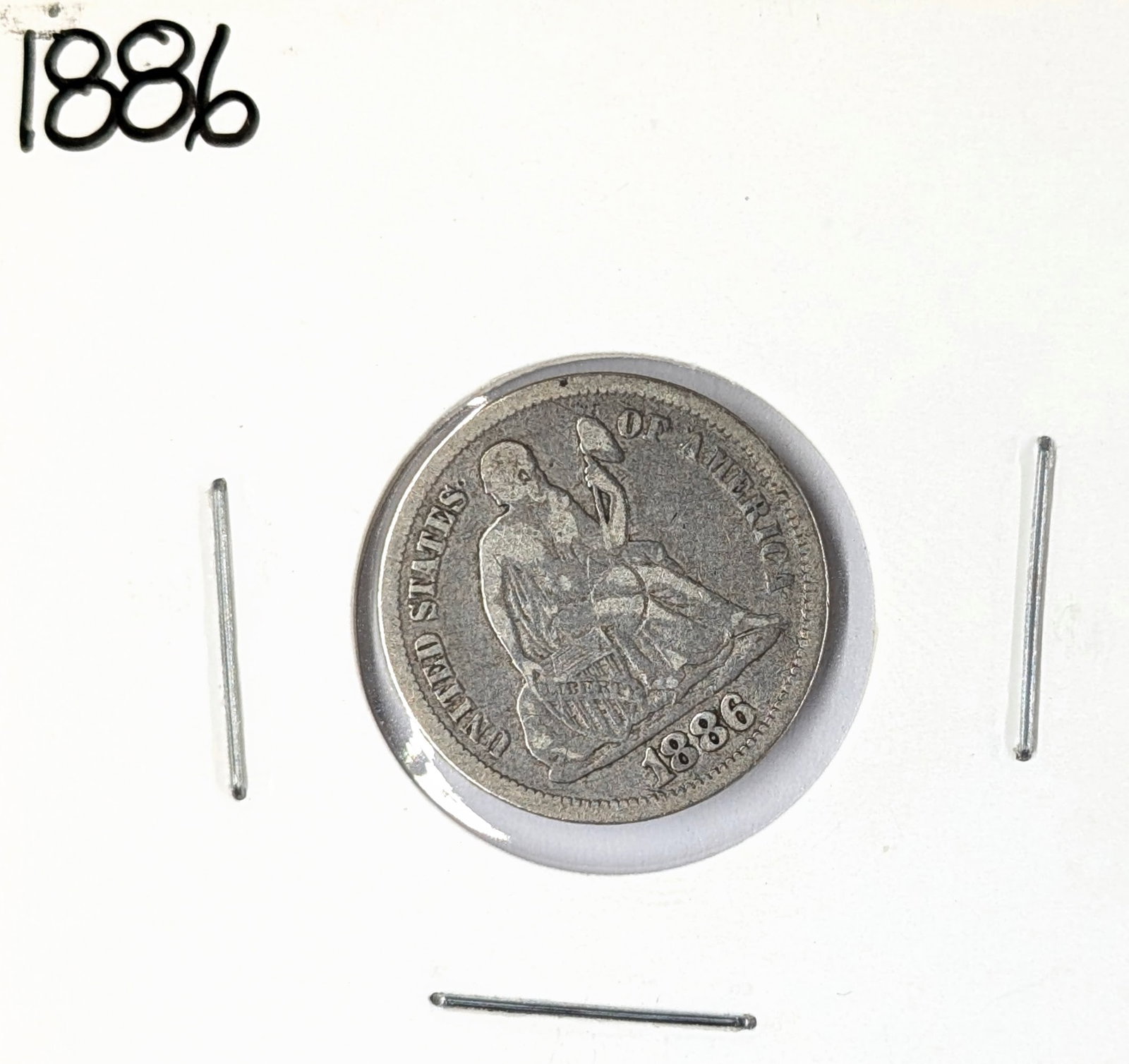 1886 Silver Seated Liberty Dime: _