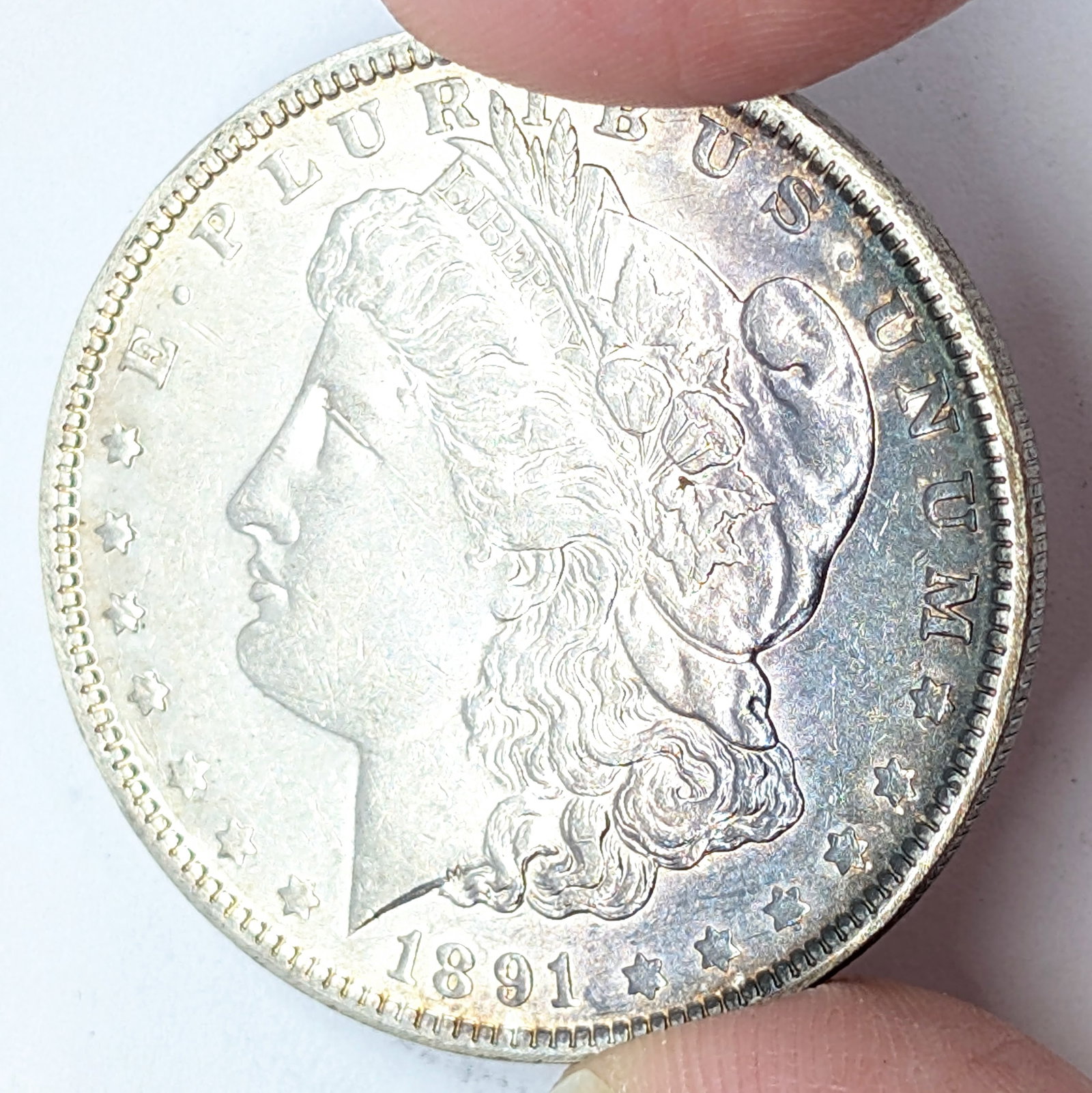 1891-O Morgan Silver Dollar - Toned (1 of 3)