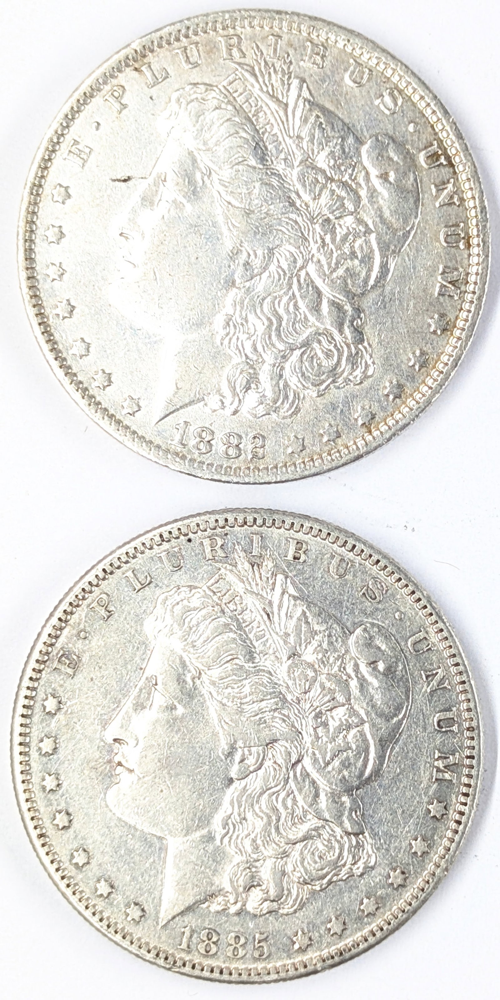 Lot of 2 Morgan Silver Dollars - 1882-O, 1885-S (1 of 2)