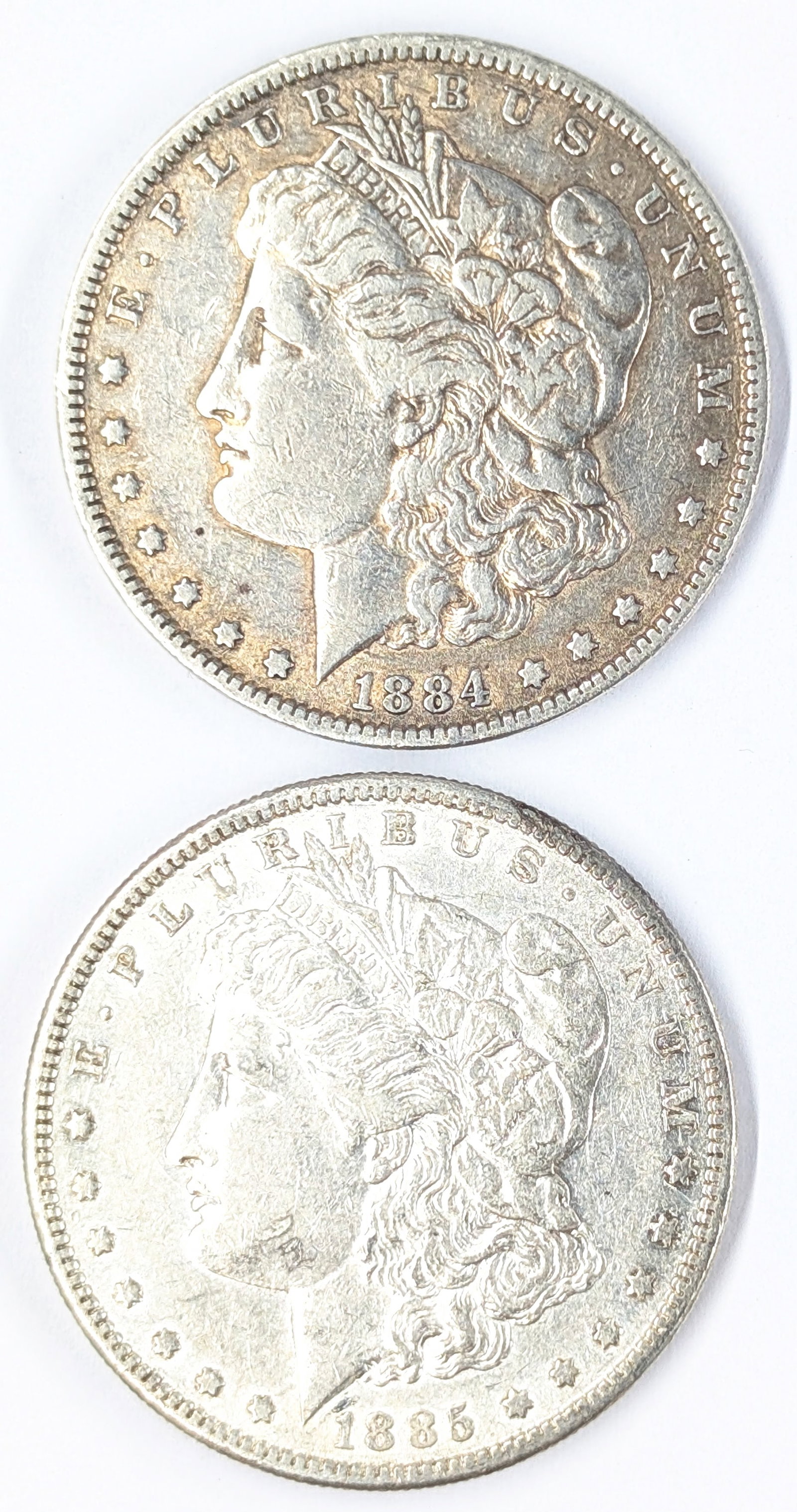 Lot of 2 Morgan Silver Dollars - 1884, 1885-S (1 of 2)