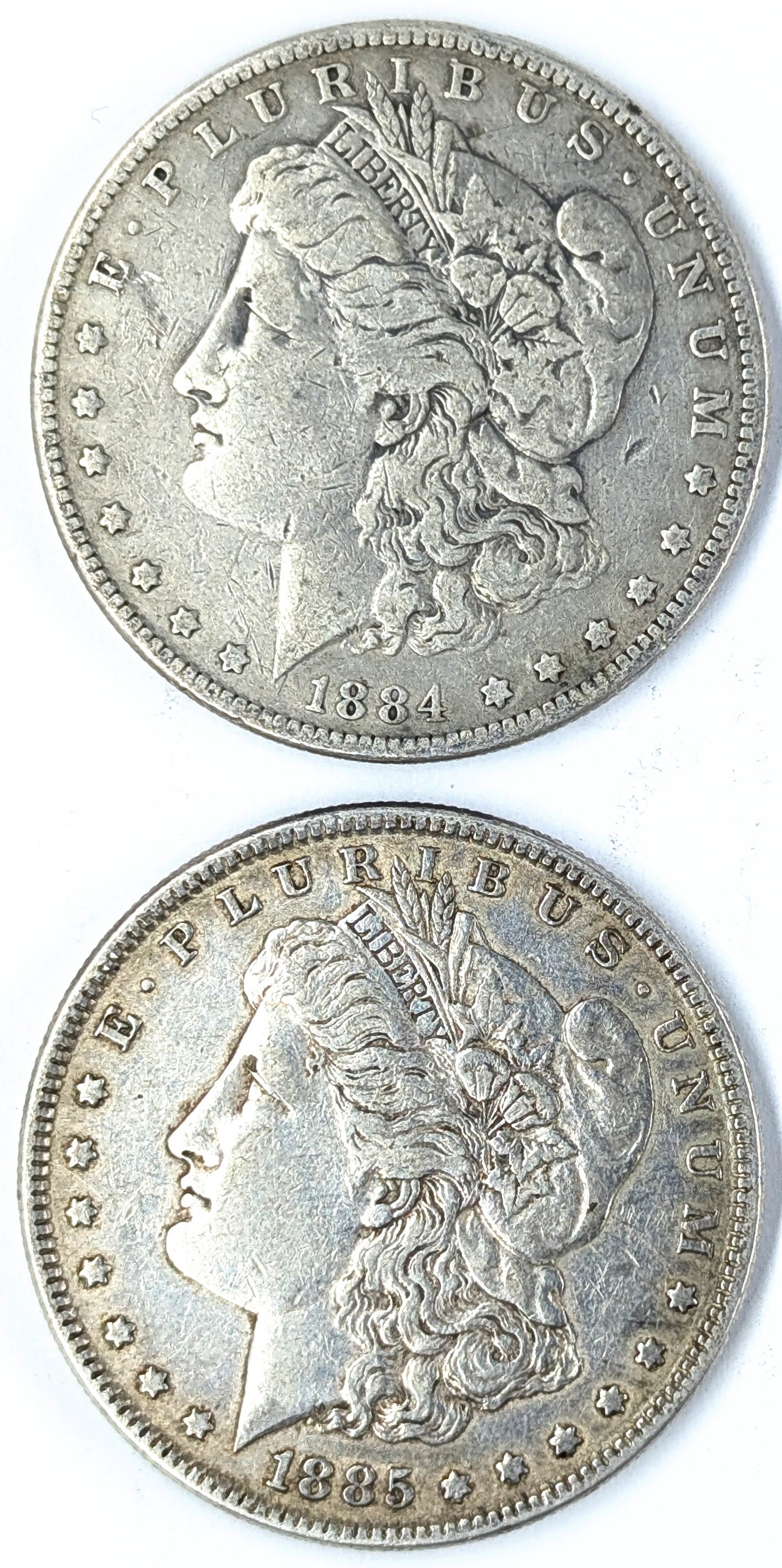 Lot of 2 Morgan Silver Dollars - 1884, 1885: Silver
