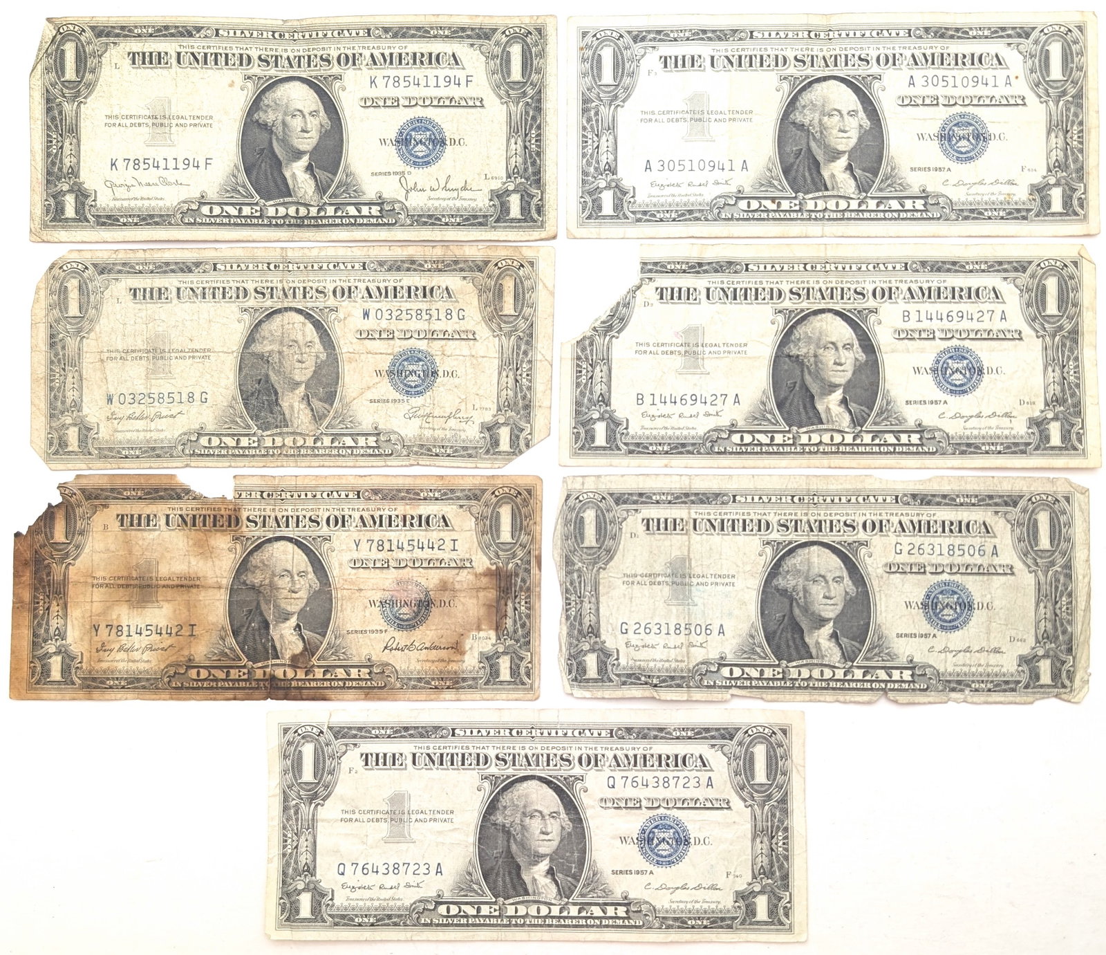 Lot of 7 - 1935 $1 Notes - Silver Certificates: Heavily Circulated Condition