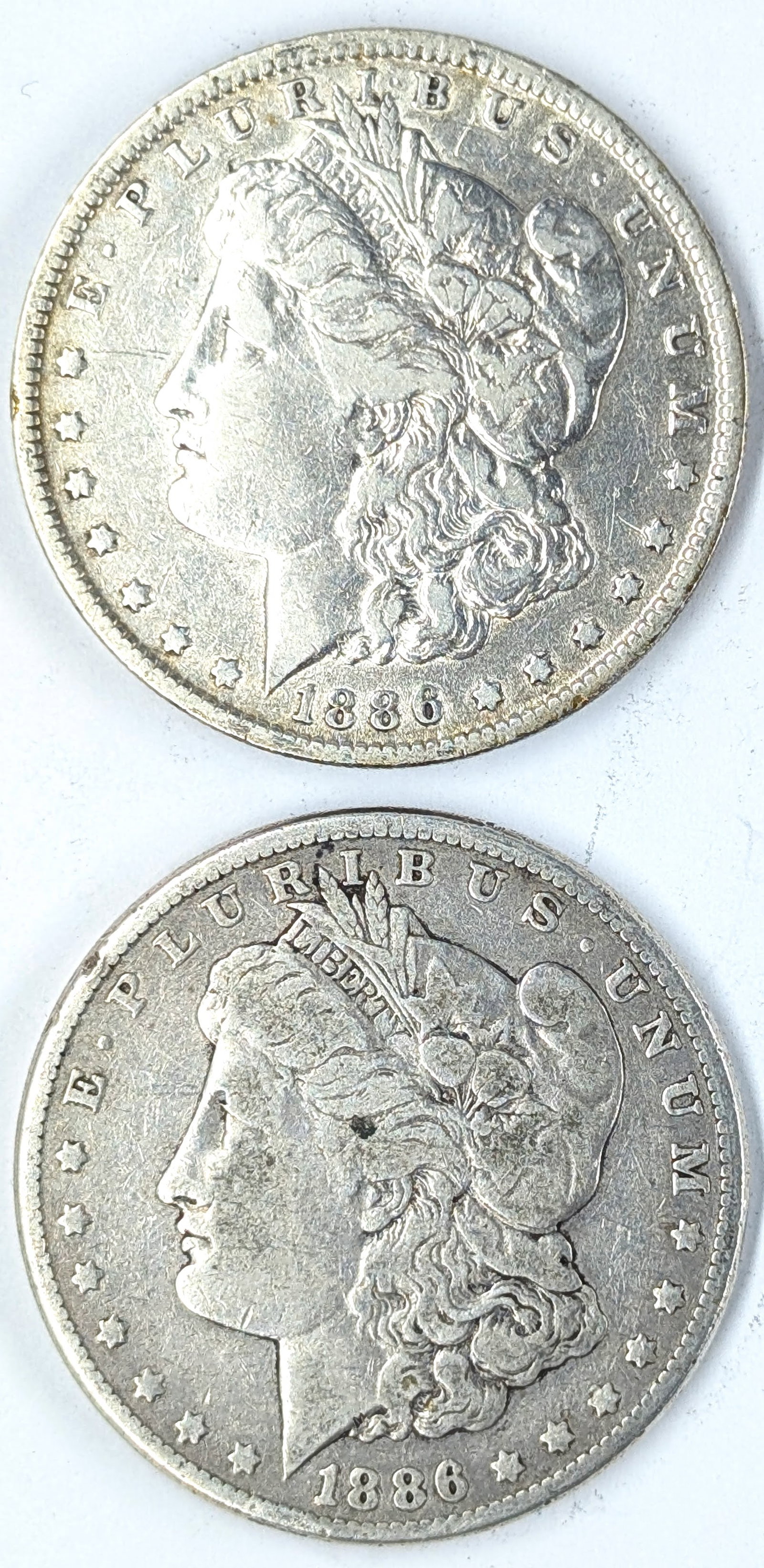 Lot of 2 Morgan Silver Dollars - 1886 P/O: Silver