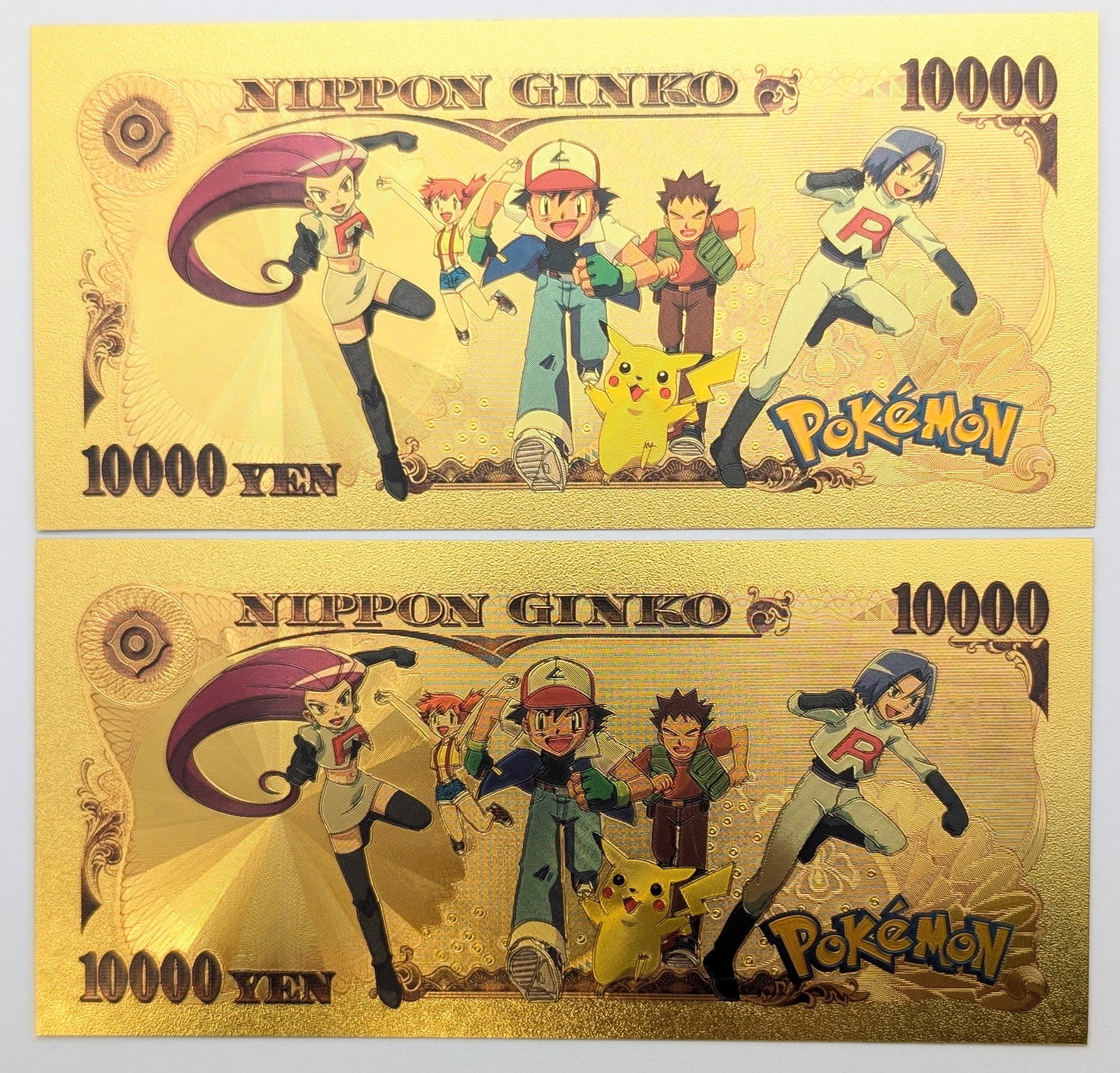 Lot of 2 Pokemon Gold foils $10000 designs - 2