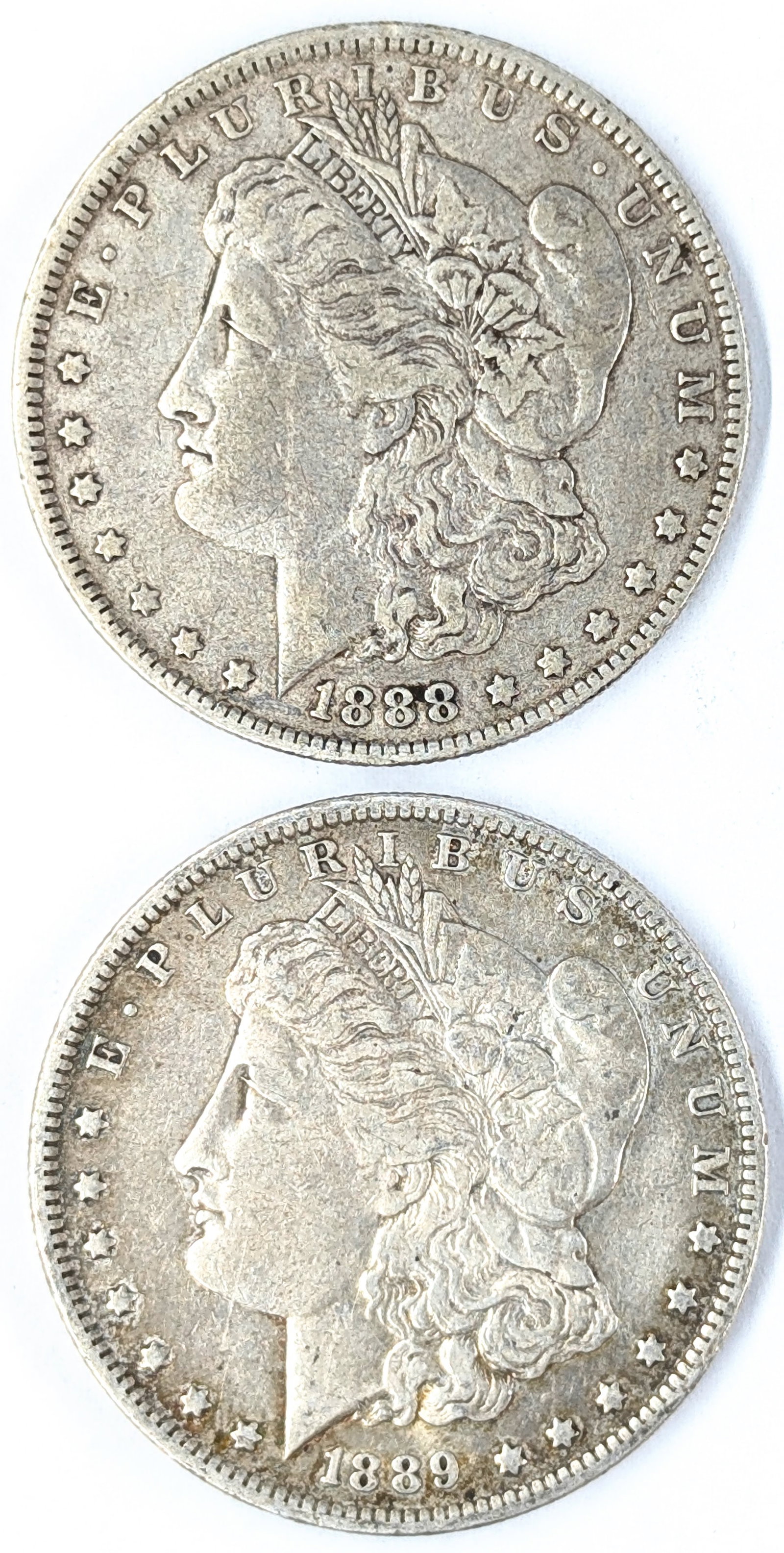 Lot of 2 Morgan Silver Dollars - 1888-O, 1889-O (1 of 2)