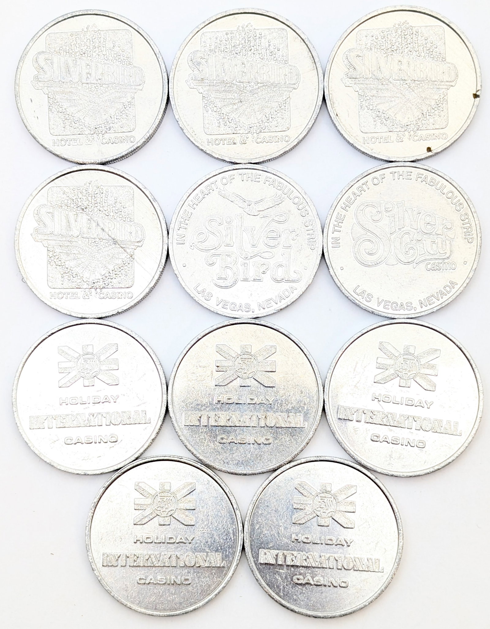 Lot of 11 Silverbird & Holiday International Casino Tokens: Tokens