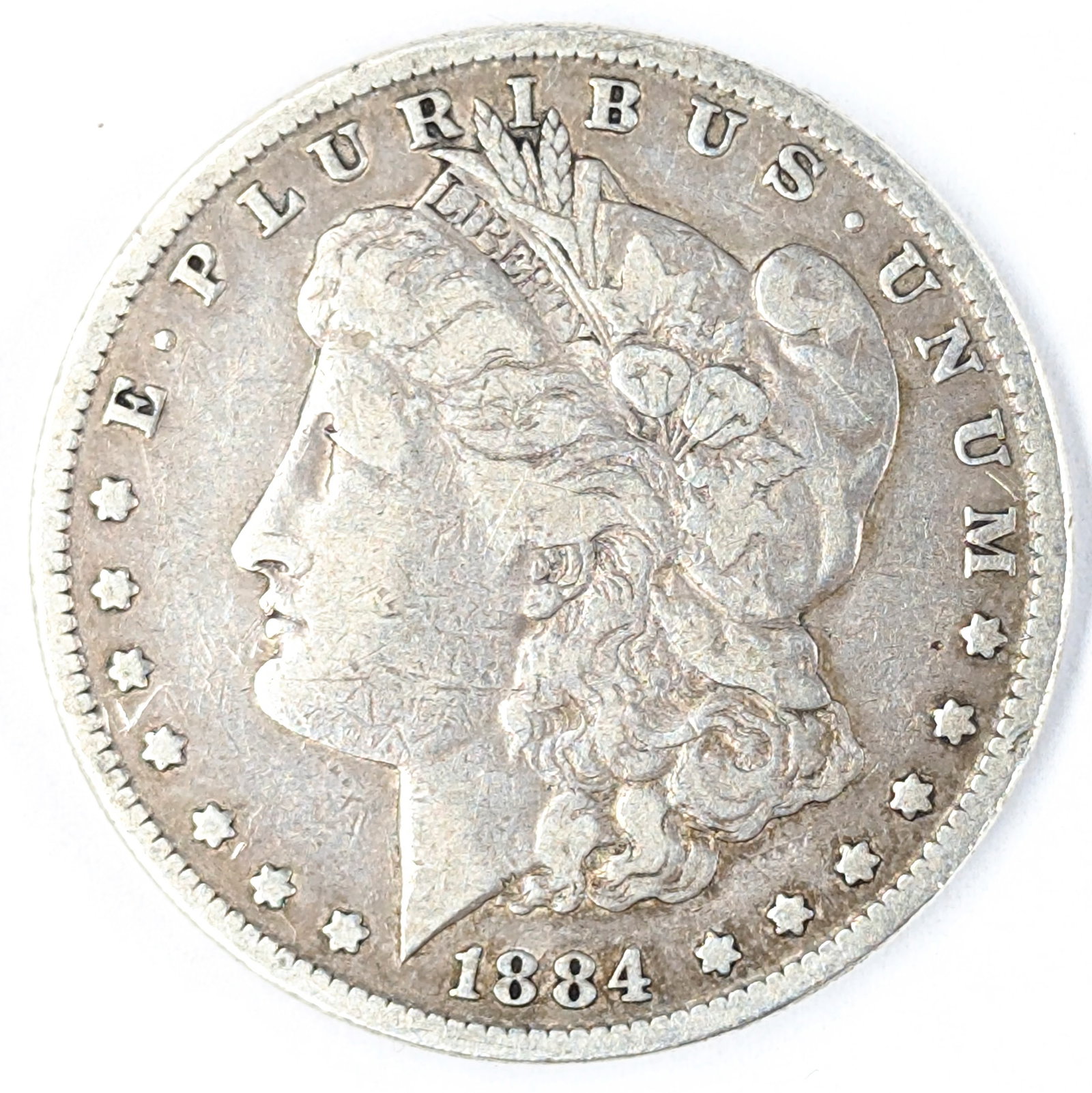 1884 Morgan Silver Dollar: _