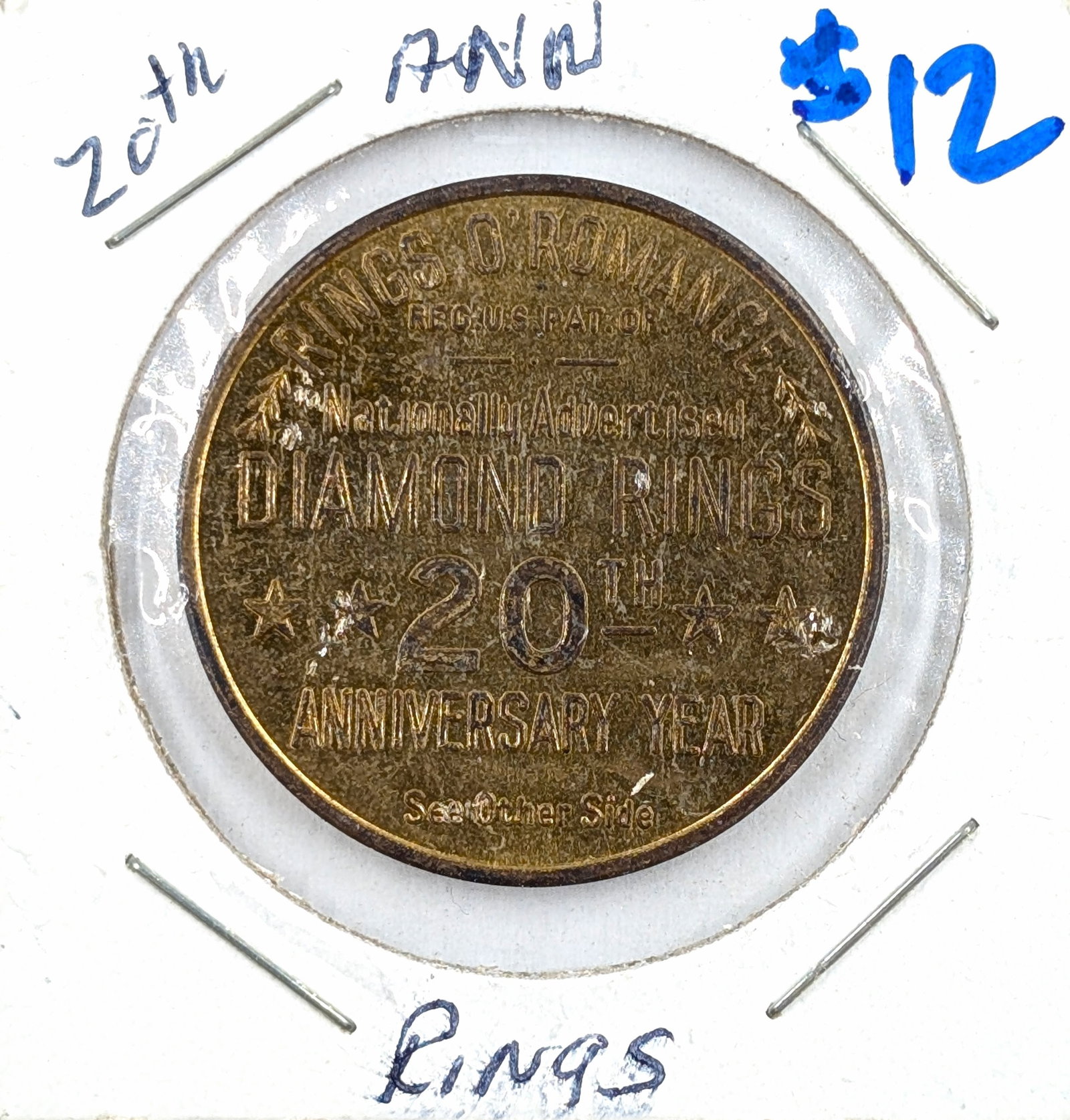 1930s-1950s Rings O'Romance Token: _