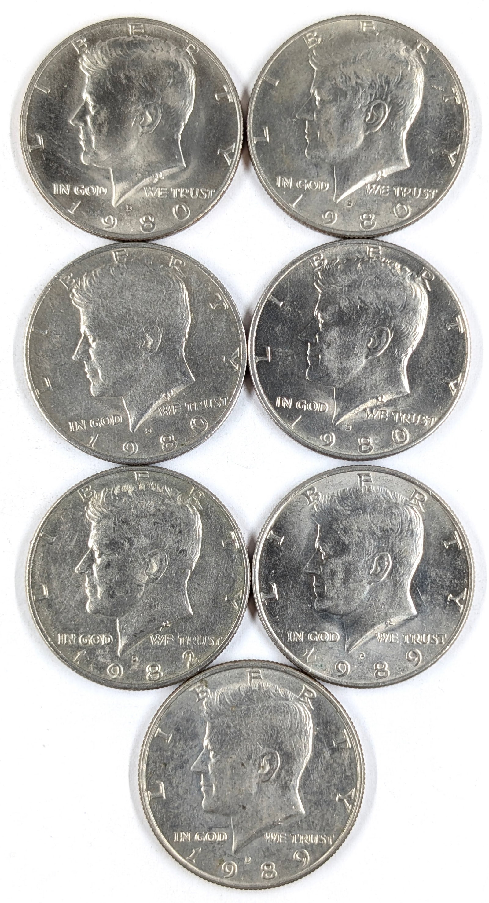 Lot of 7 John F Kennedy Half Dollars- 1980-1989: Most Uncirculated