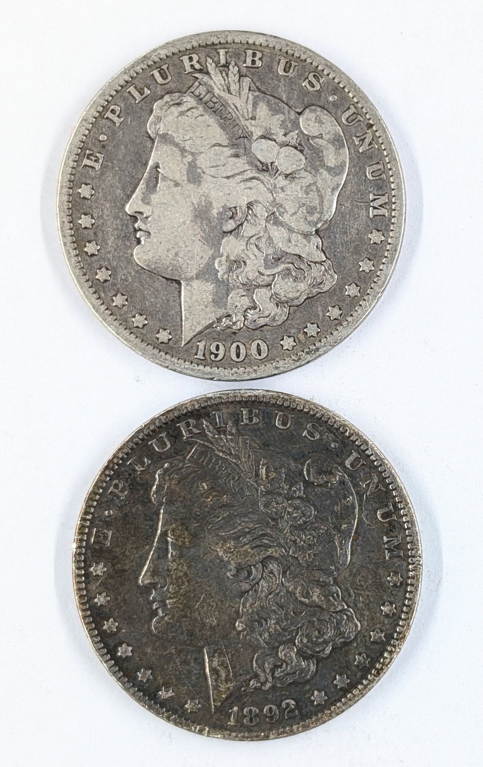 Lot of 2 Morgan Silver Dollars- 1900-O, 1892-O (1 of 2)