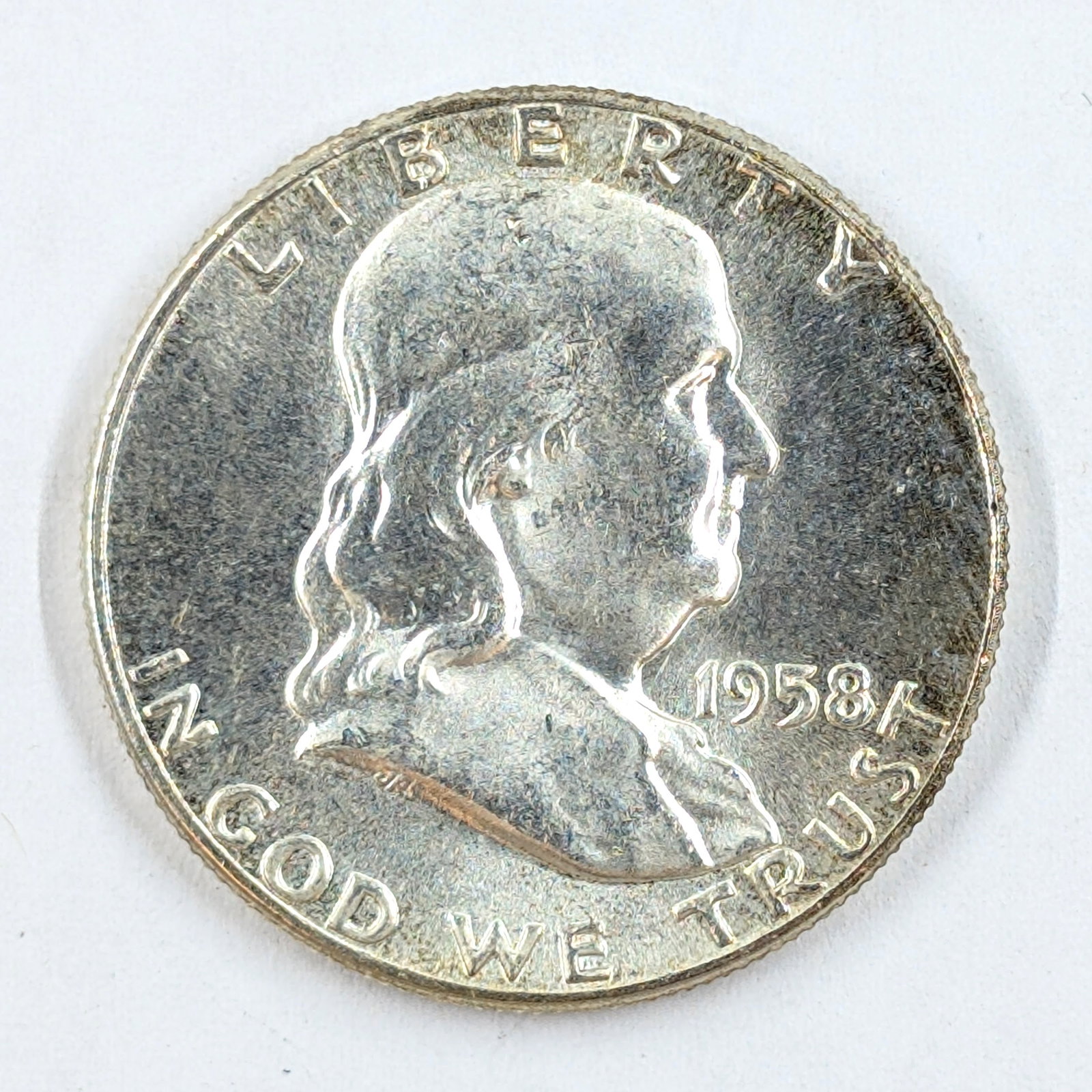 1958 Silver Franklin Half Dollar- Uncirculated (1 of 2)