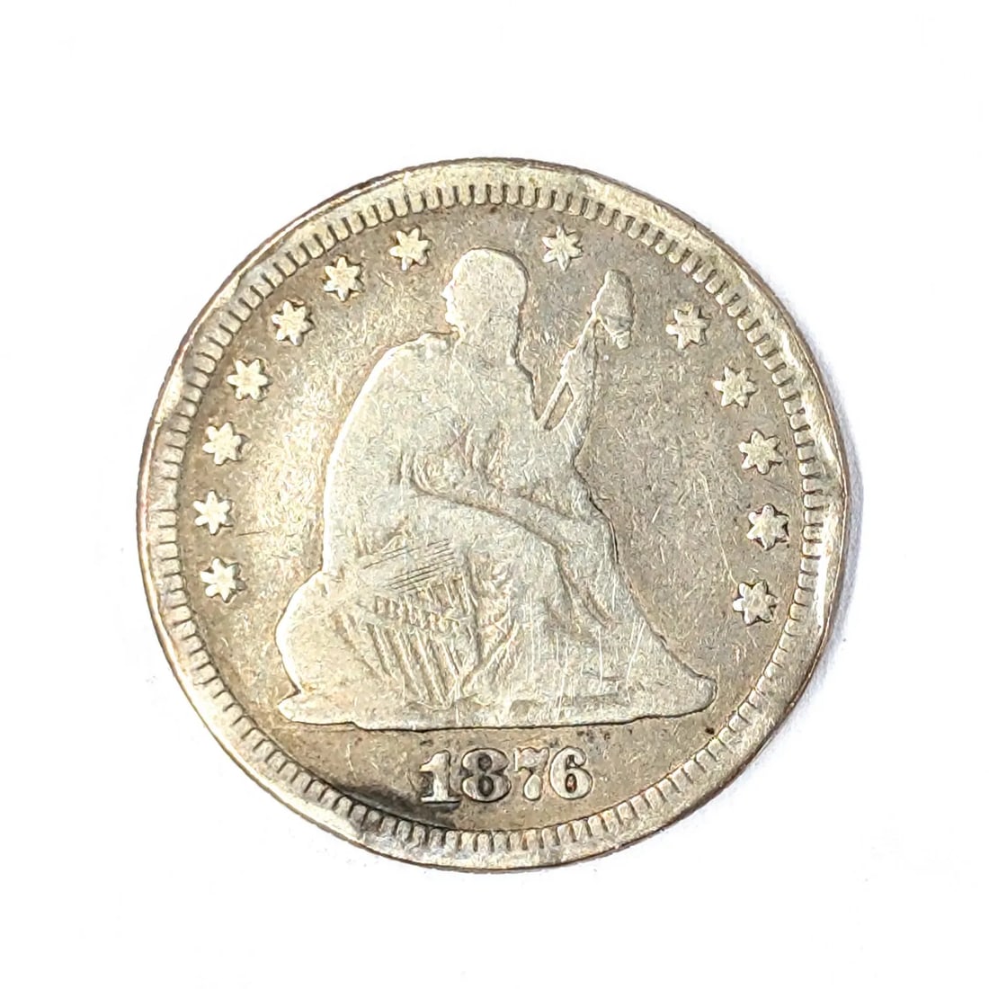 1876 Silver Seated Liberty Quarter: Silver