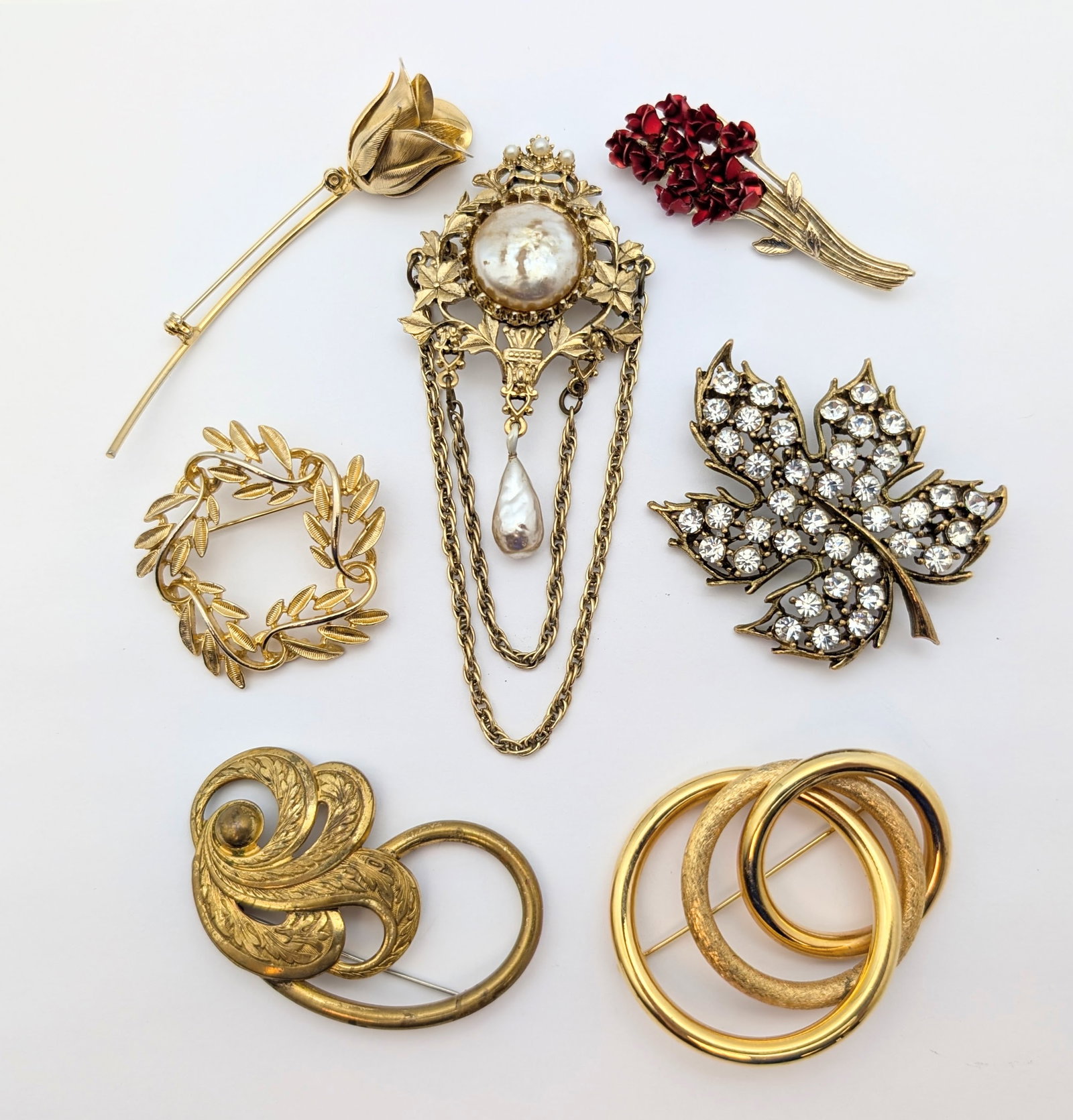 Lot of 7 Vintage Gold Toned Pins/Brooches- Rose, Leaf, Art Deco Style, etc: _