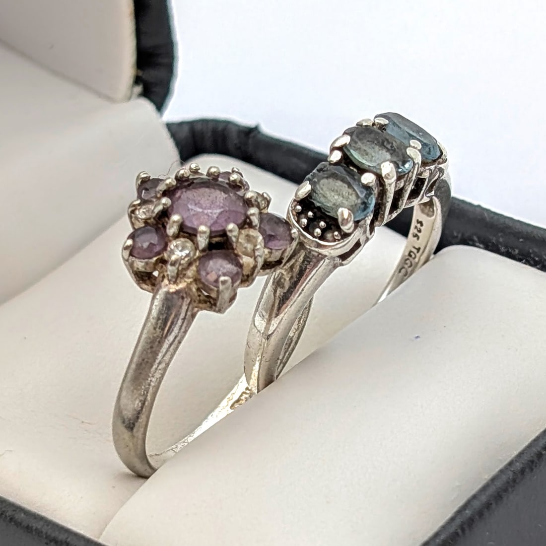 Lot of 2 Sterling Silver Rings- Cluster Ring w/ Purple Stones, Three Stone Ring w/ Blue Stones: Size: 7.75, 7.25