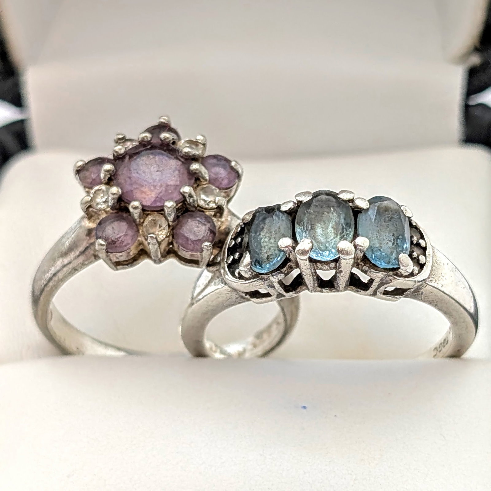 Lot of 2 Sterling Silver Rings- Cluster Ring w/ Purple Stones, Three Stone Ring w/ Blue Stones - 2