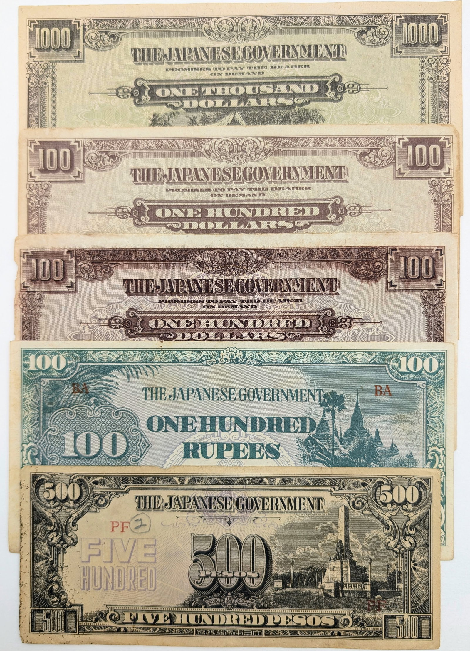 Lot of 5 Japanese Government Invasion Notes- 100 Rupees, 500 Pesos, etc (1 of 2)