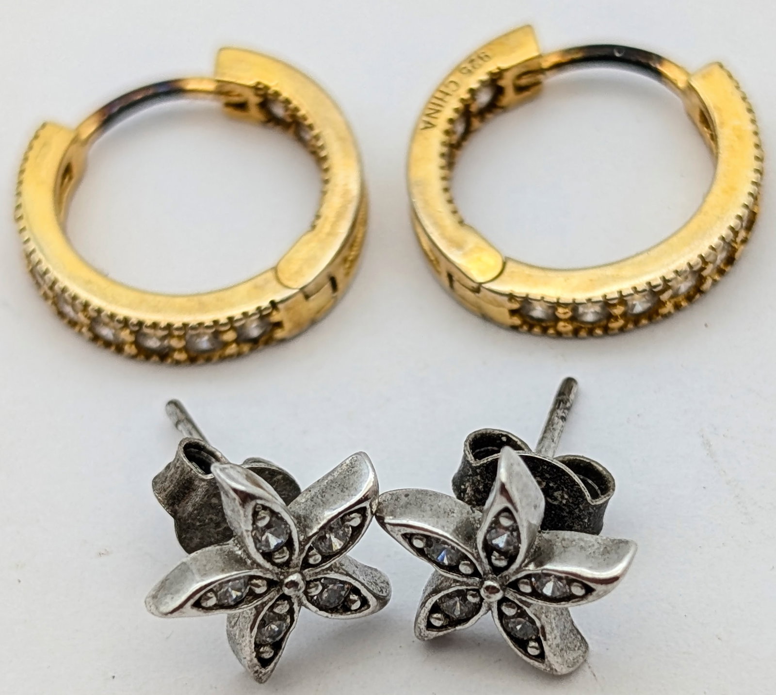 Lot of 2 Sterling Silver Earrings- Hoop, Flower: _