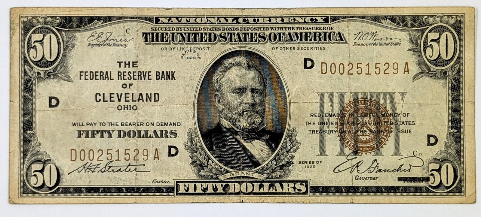1929 Series $50 Note The Federal Reserve Bank of Cleveland - Brown Seal: Condition is circulated with creases and writing on reverse.