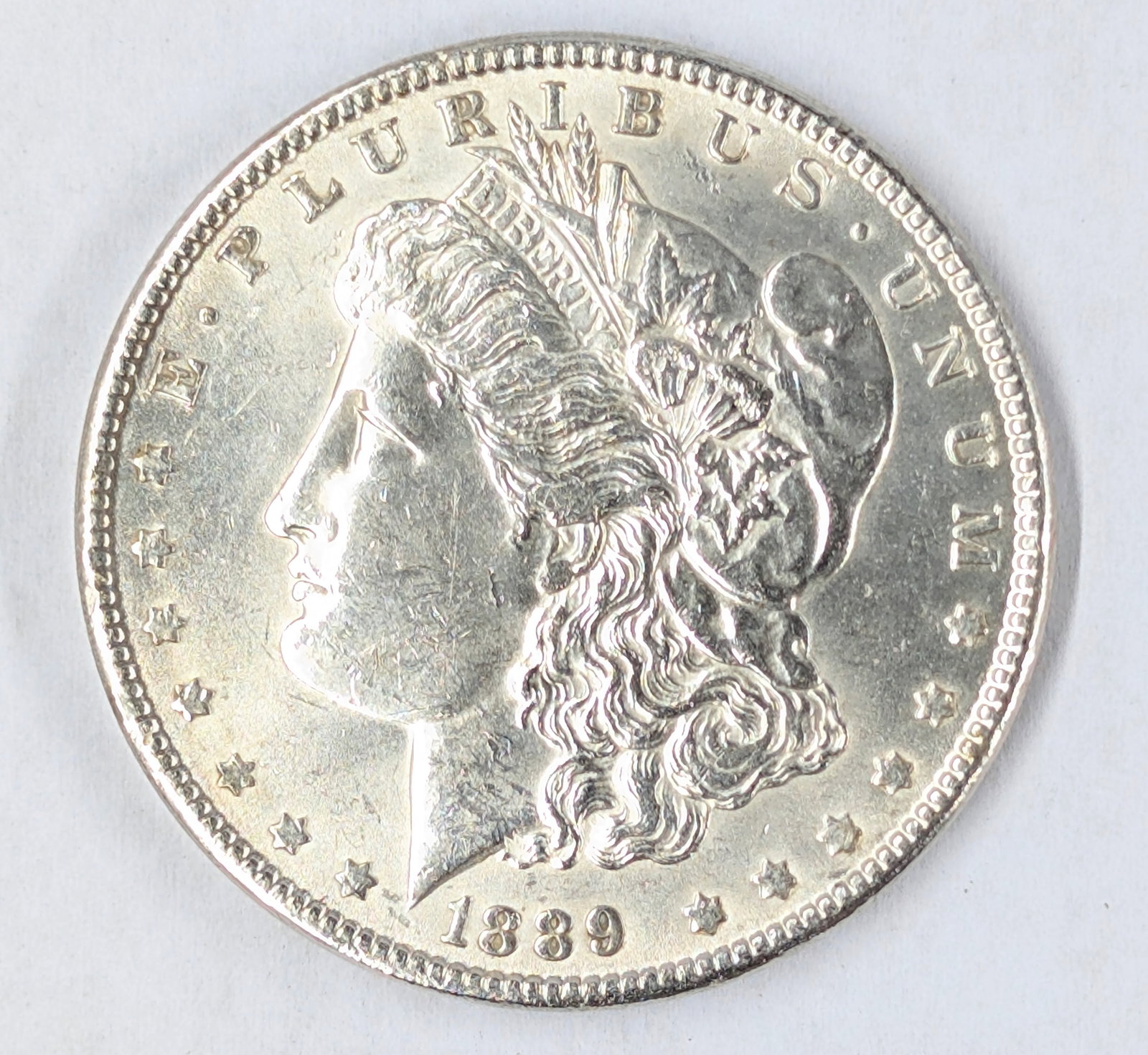 1889 Morgan Silver Dollar: Excellent Condition AU/MS