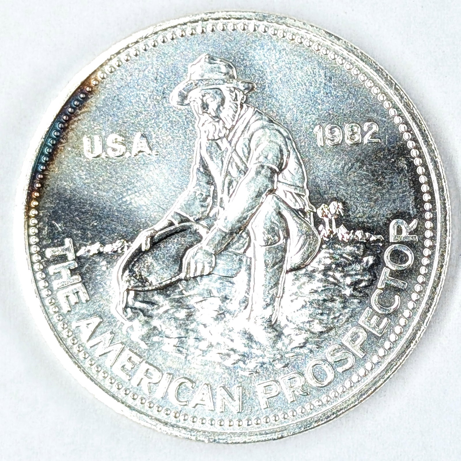 FEATURE - Toned Prospector 1982 1 oz Silver: _