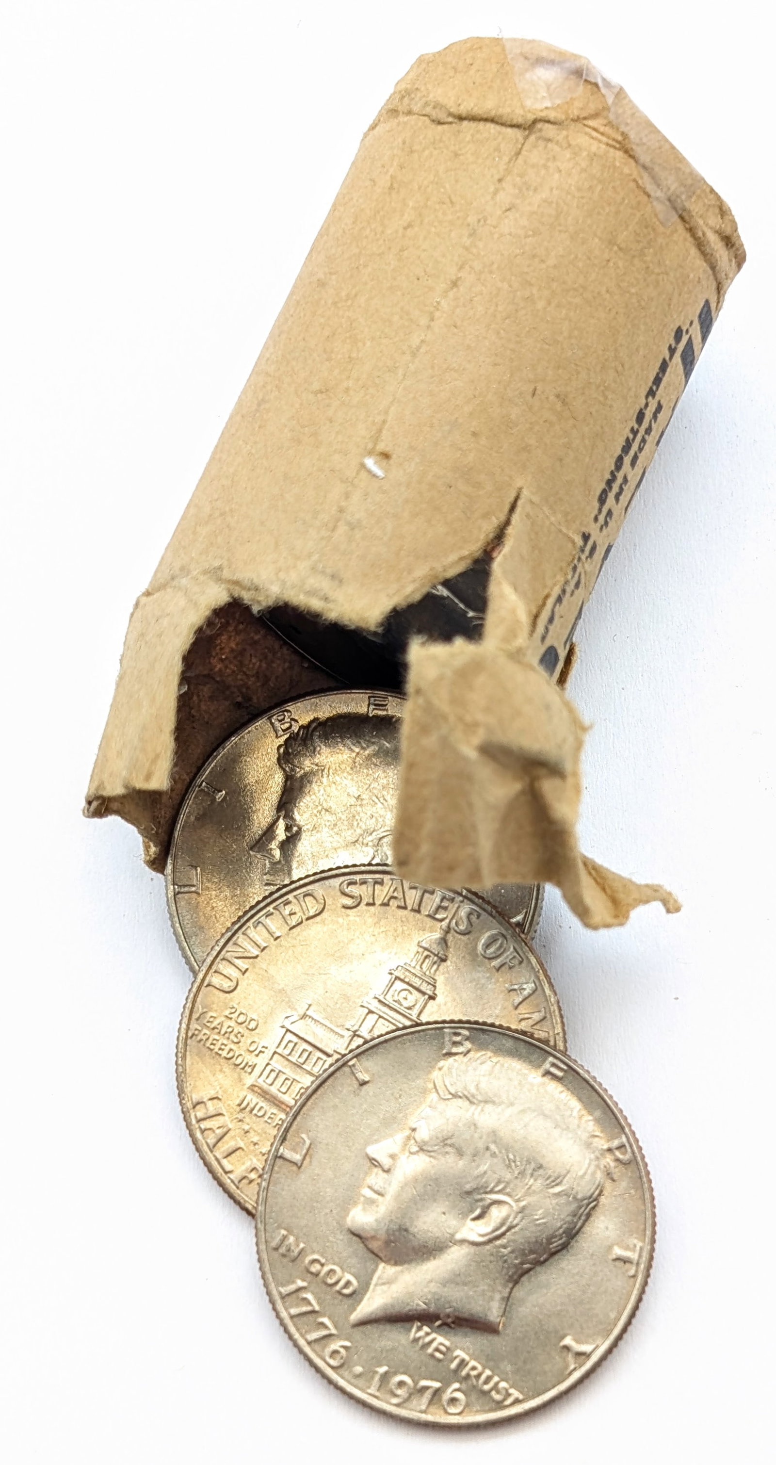 Original Roll of Bicentennial JFK 1976 Uncirculated Half Dollars: Incredible Toners - The Roll is just barely hanging on!