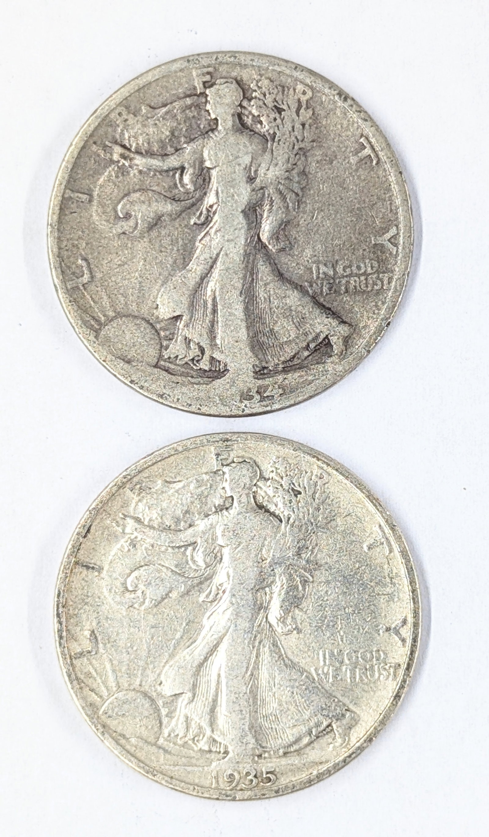 Lot of 2 Silver Walking Liberty Half Dollars - 1934 & 1935: _