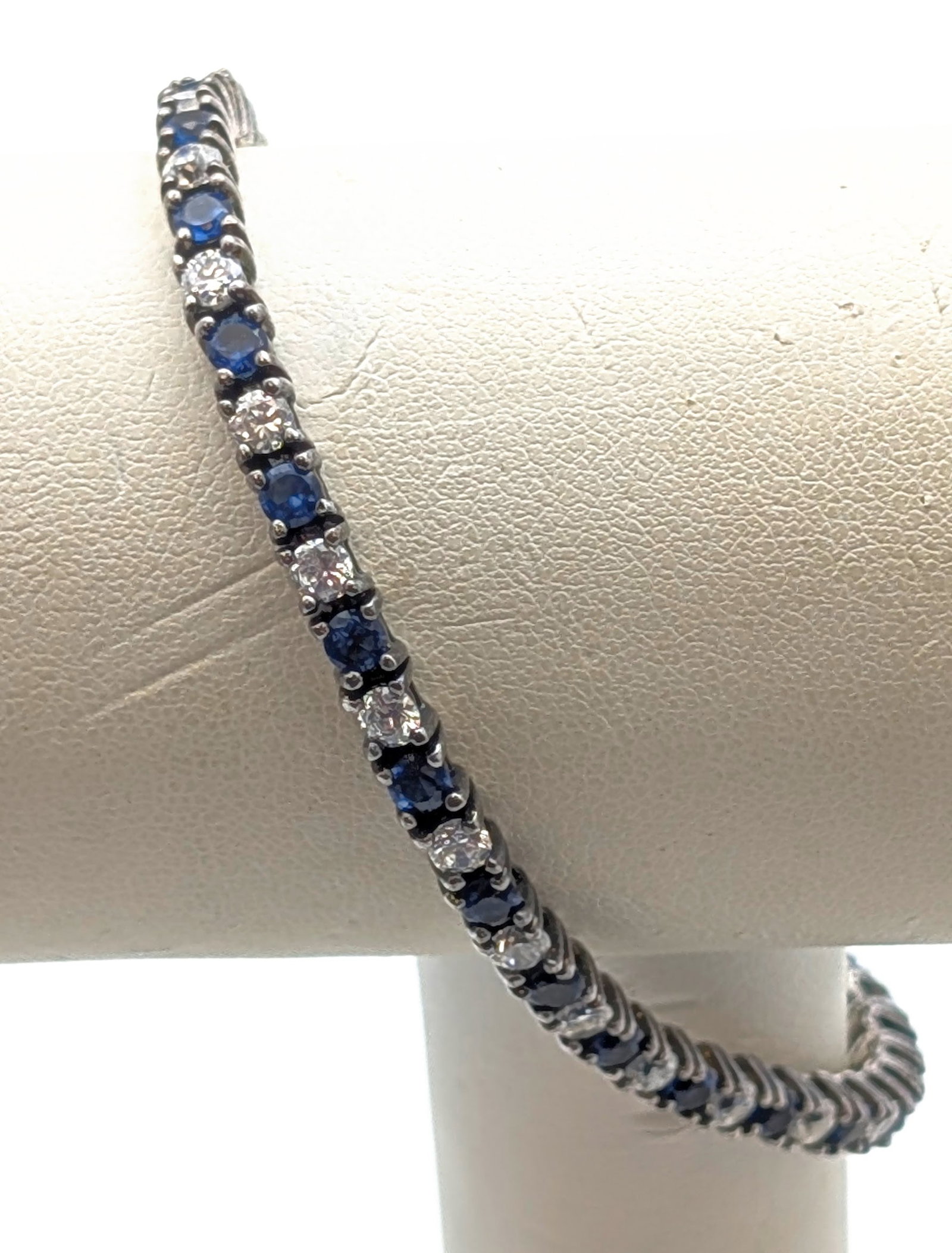 Sterling Silver Tennis Bracelet with Blue & White Stones: _