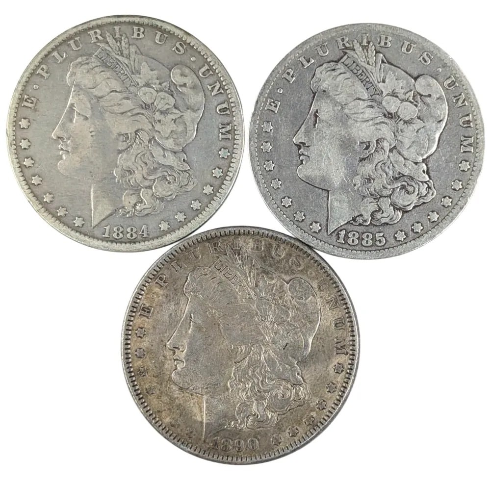 Lot of 3 Morgan Silver Dollars - 1884, 1885-O, 1890: _