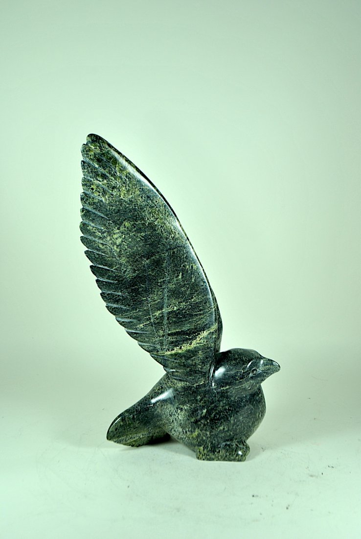Signed Nuna Parr Inuit Carved Stone Bird: 17 3/4"H x 9 1/2"L signed Nuna Parr Inuit carved stone bird.