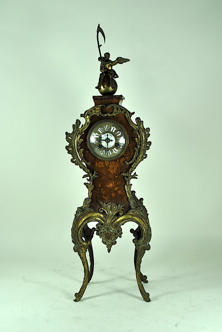 Tiffany & Co. French Marquetry & Bronze Mantle Clock: 23 3/4"H Tiffany & Co. French marquetry & bronze mantle clock w/figural 'Father Time' finial, bronze over enamel face & Vincente movement dated 1855.