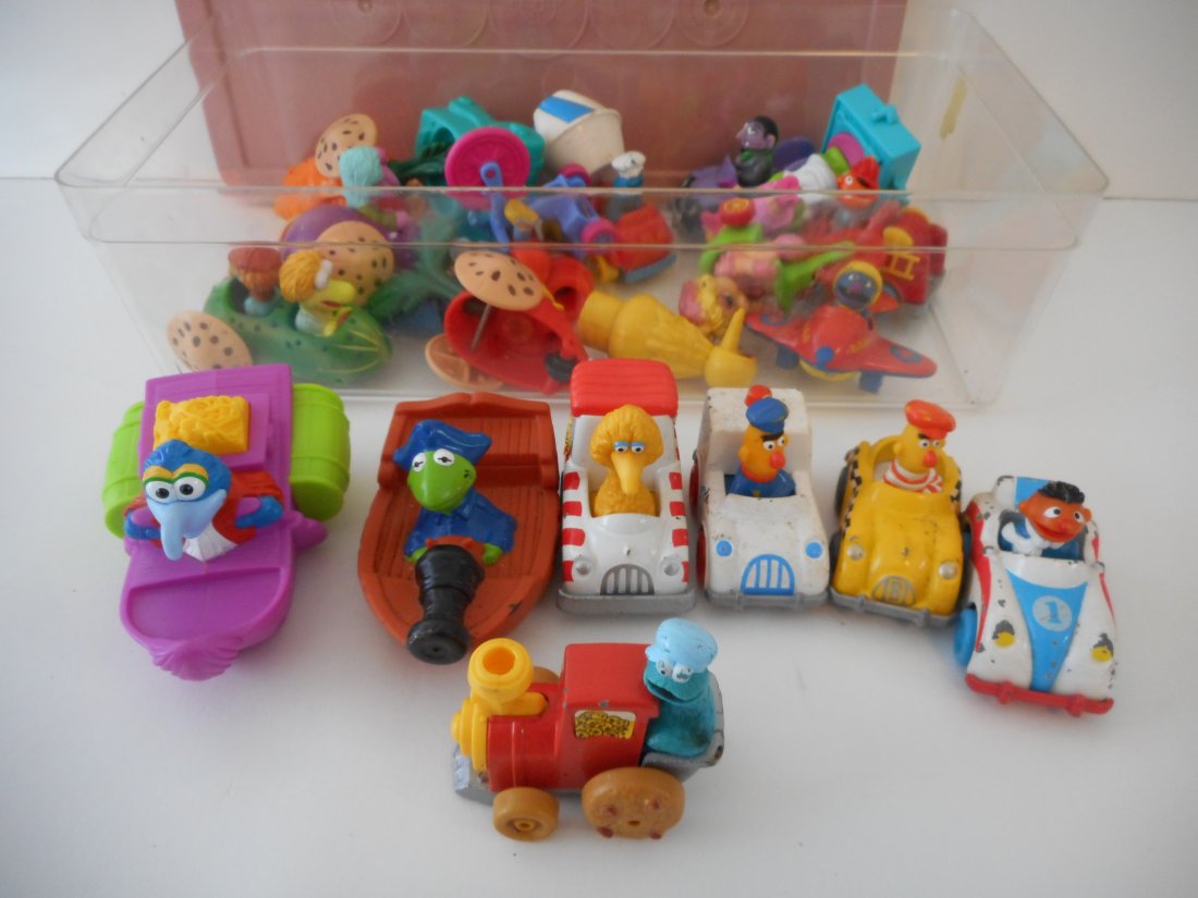 Collection of Pre-loved Sesame Street toys, Characters in various vehicles: Stored in plastic container shown, garage find, need cleaning Bidding on this item is acceptance of our posted Auction Policy