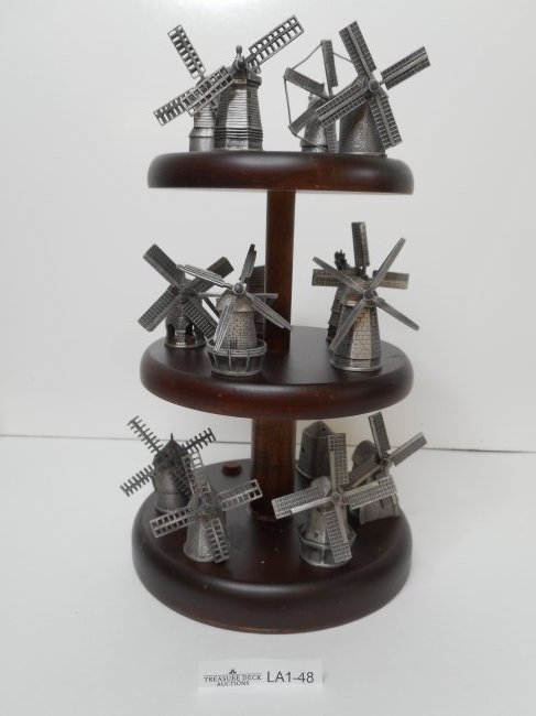 Fourteen (14) Pewter Thimbles - Historic Windmills Thimble Collection of 1988 on wooden 3-tier stand: two are missing blades Bidding on this item is acceptance of our posted Auction Policy