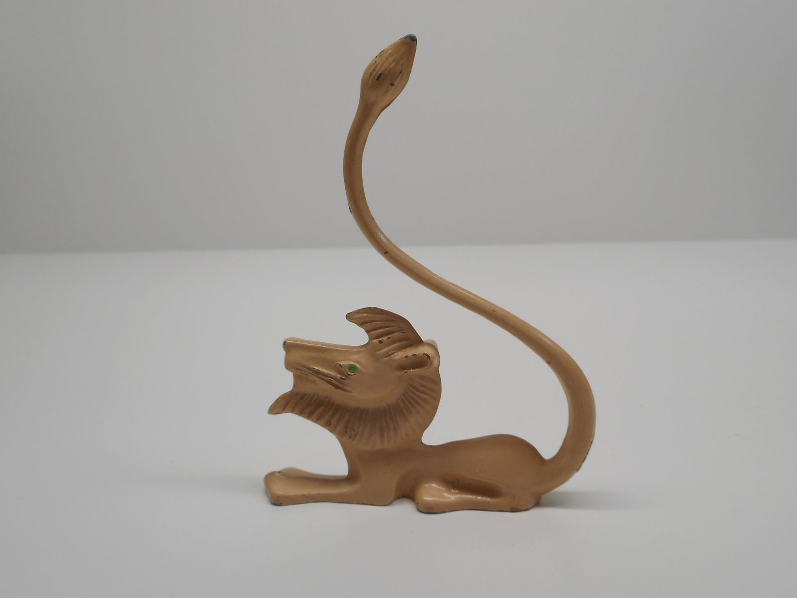 Vintage 1960s REVERE MFG Metal Tan Lion with Green Eyes, Ring Tree, Jewelry Holder, 4-inch tail: Bidding on this item will be indication that the Bidder acknowledges that they have read and agreed to the Terms and Conditions posted to this Auction