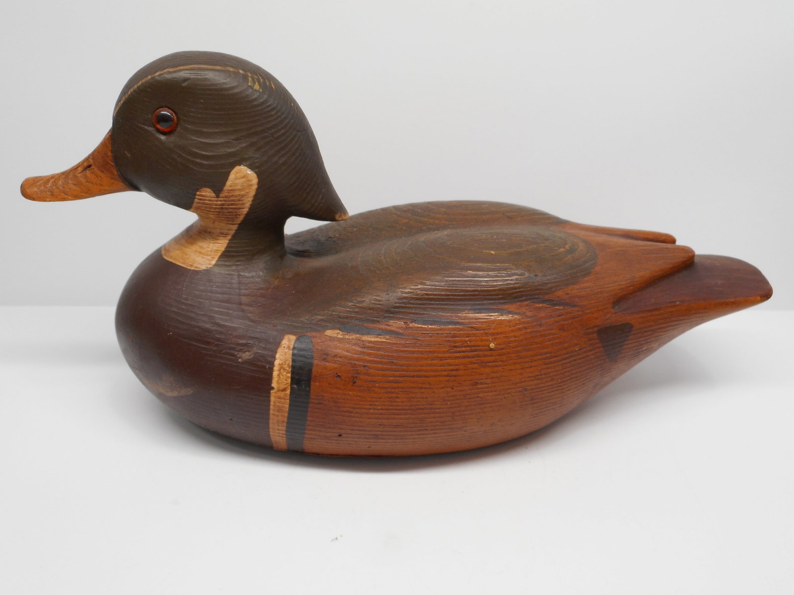 Carved and Painted Wooden Duck Decoy with Markings, Folk Art Decor, Hallmarked, 12 inches: Bidding on this item will be indication that the Bidder acknowledges that they have read and agreed to the Terms and Conditions posted to this Auction