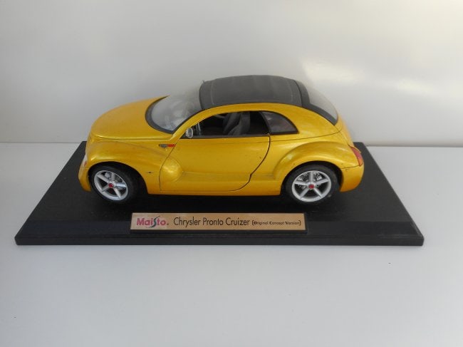 Bright Pearlized Yellow 1998 Chrysler Pronto Cruizer Model, Maisto, Original Concept Version,Opens: Base is 12 inches long Bidding on this item will be indication that the Bidder acknowledges that they have read and agreed to the Terms and Conditions posted to this Auction